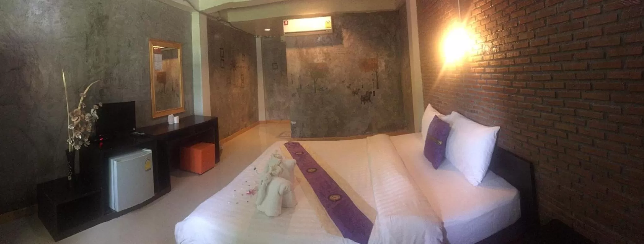 Bed in Bamboo House Resort