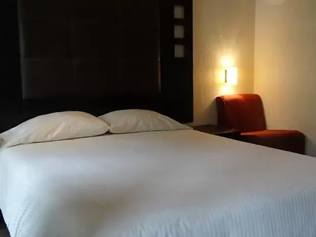 Bed, Room Photo in Aztic Hotel and Executive Suites
