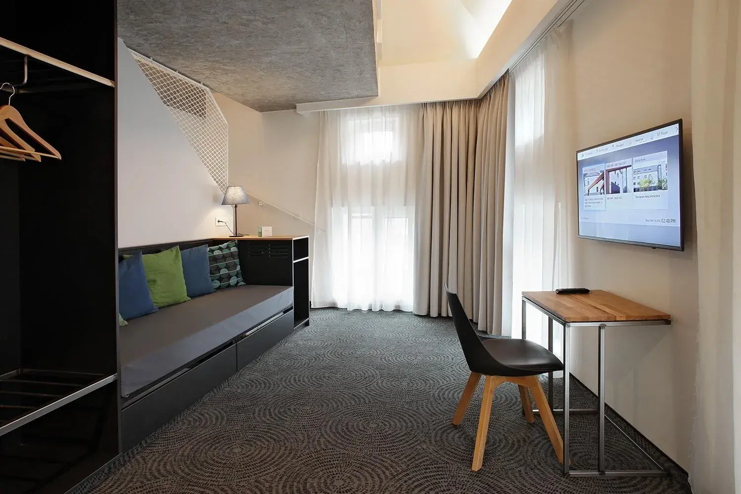 Seating area, TV/Entertainment Center in Hotel Van Belle