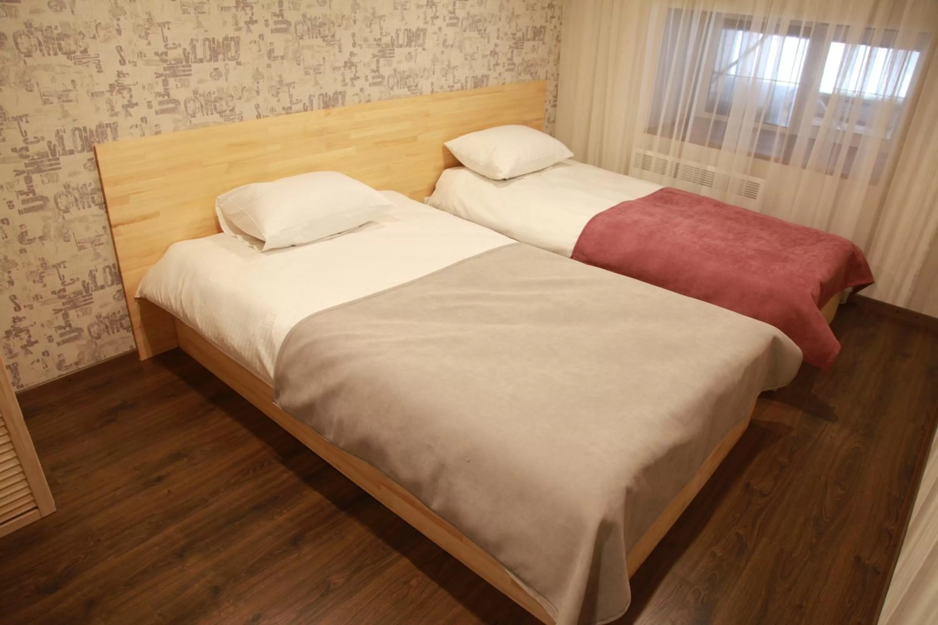 Bed in WINE & ROSE BOUTIQUE HOTEL