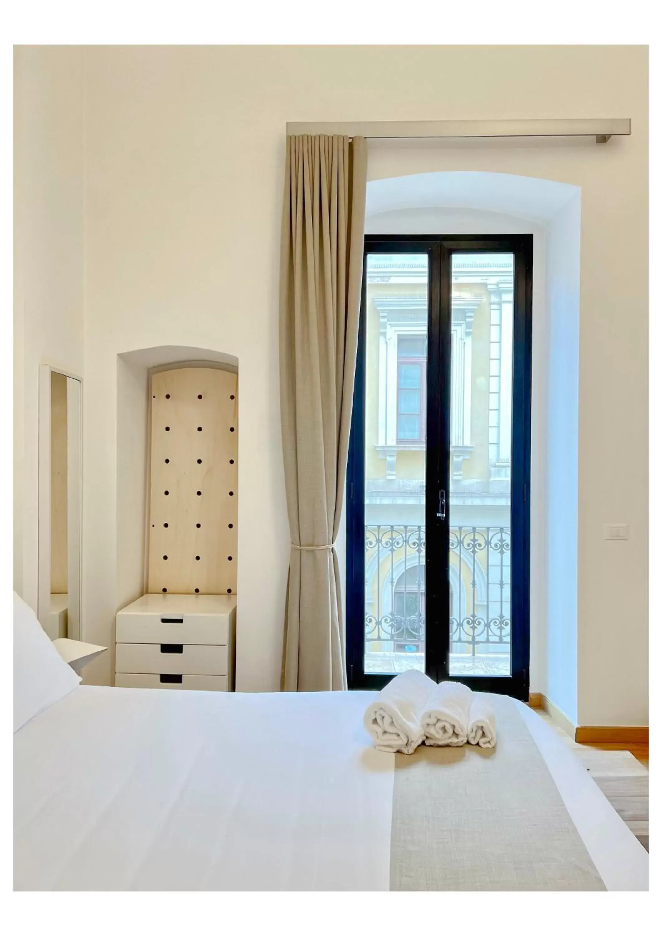 Bed in Imago Plus Hotel