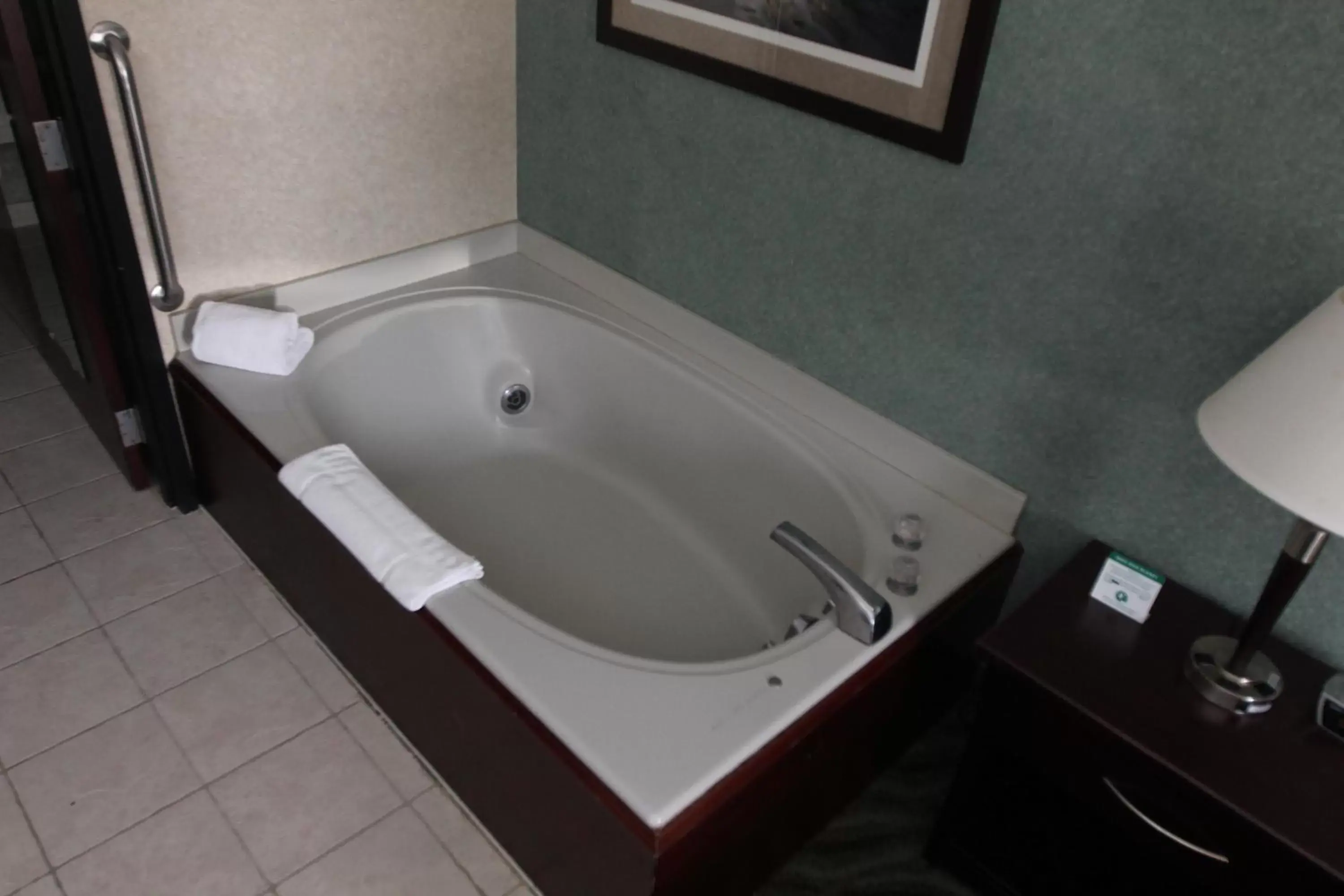 Bath, Bathroom in Days Inn & Suites by Wyndham Rochester Hills MI