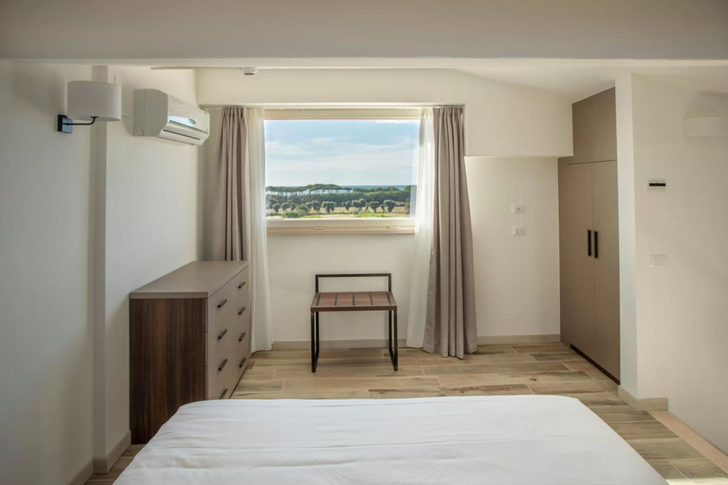 Sea view, Bed in Riva Toscana Golf Resort & SPA