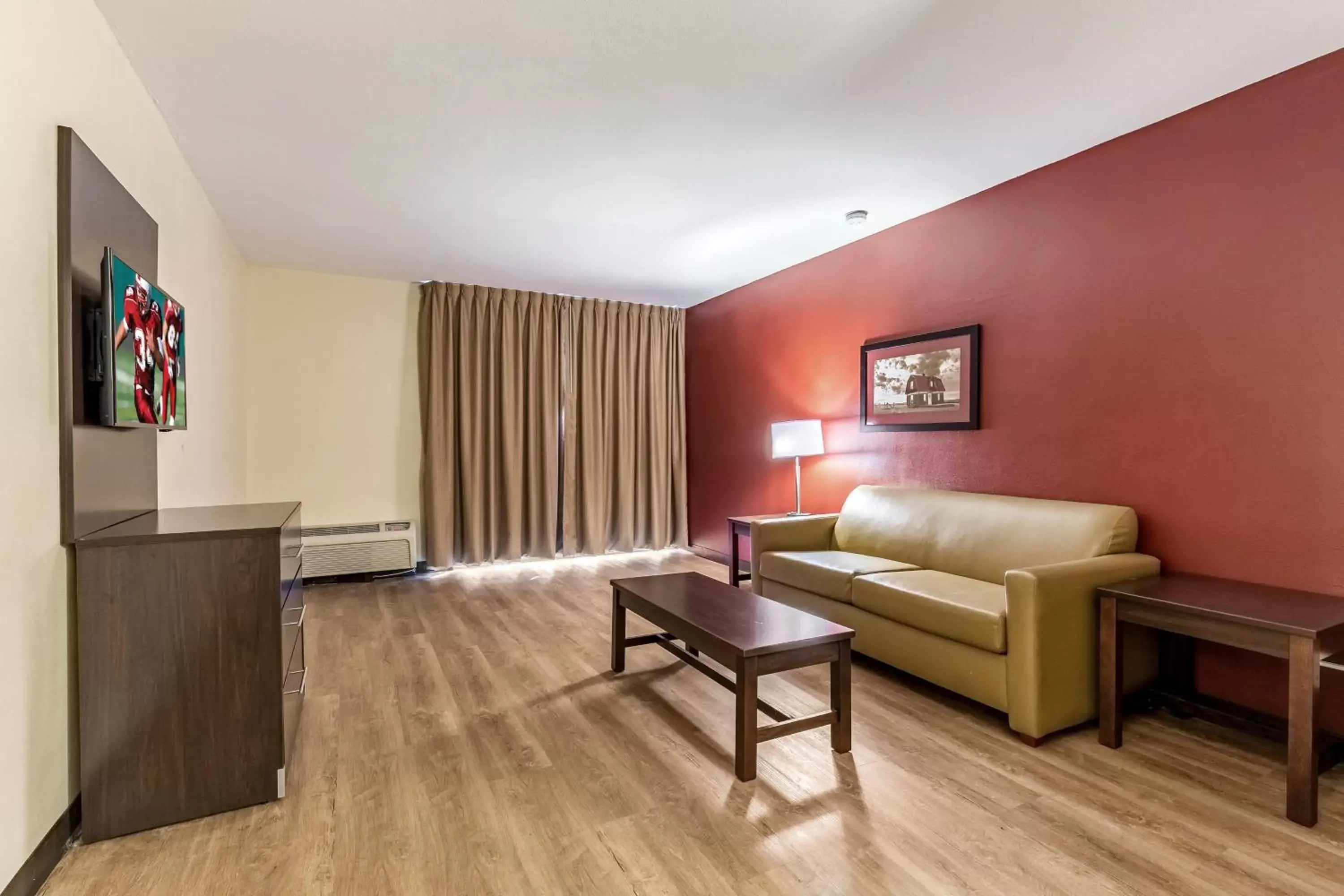 Photo of the whole room, Seating Area in Red Roof Inn PLUS & Suites Houston - IAH Airport SW