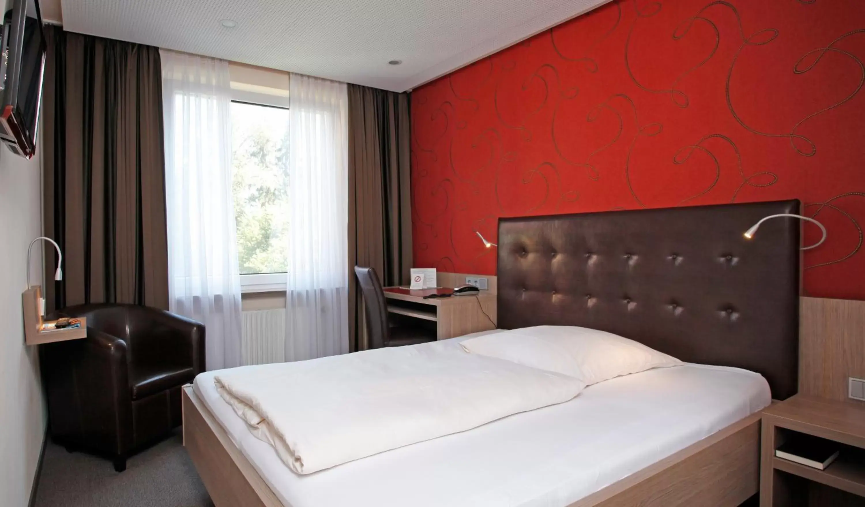 Bed in Hotel Rennschuh