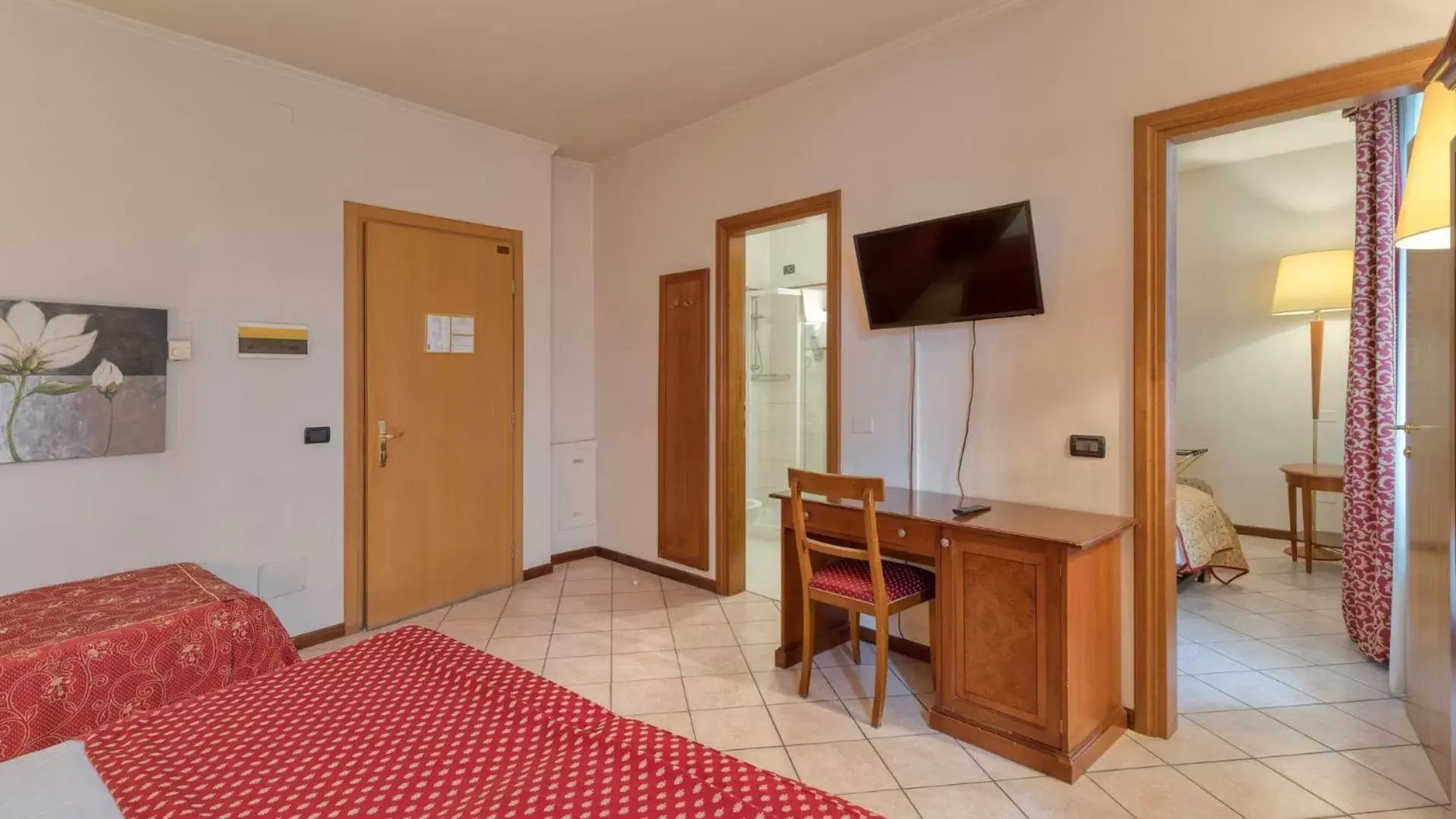 Photo of the whole room, TV/Entertainment Center in Primotel Brescia