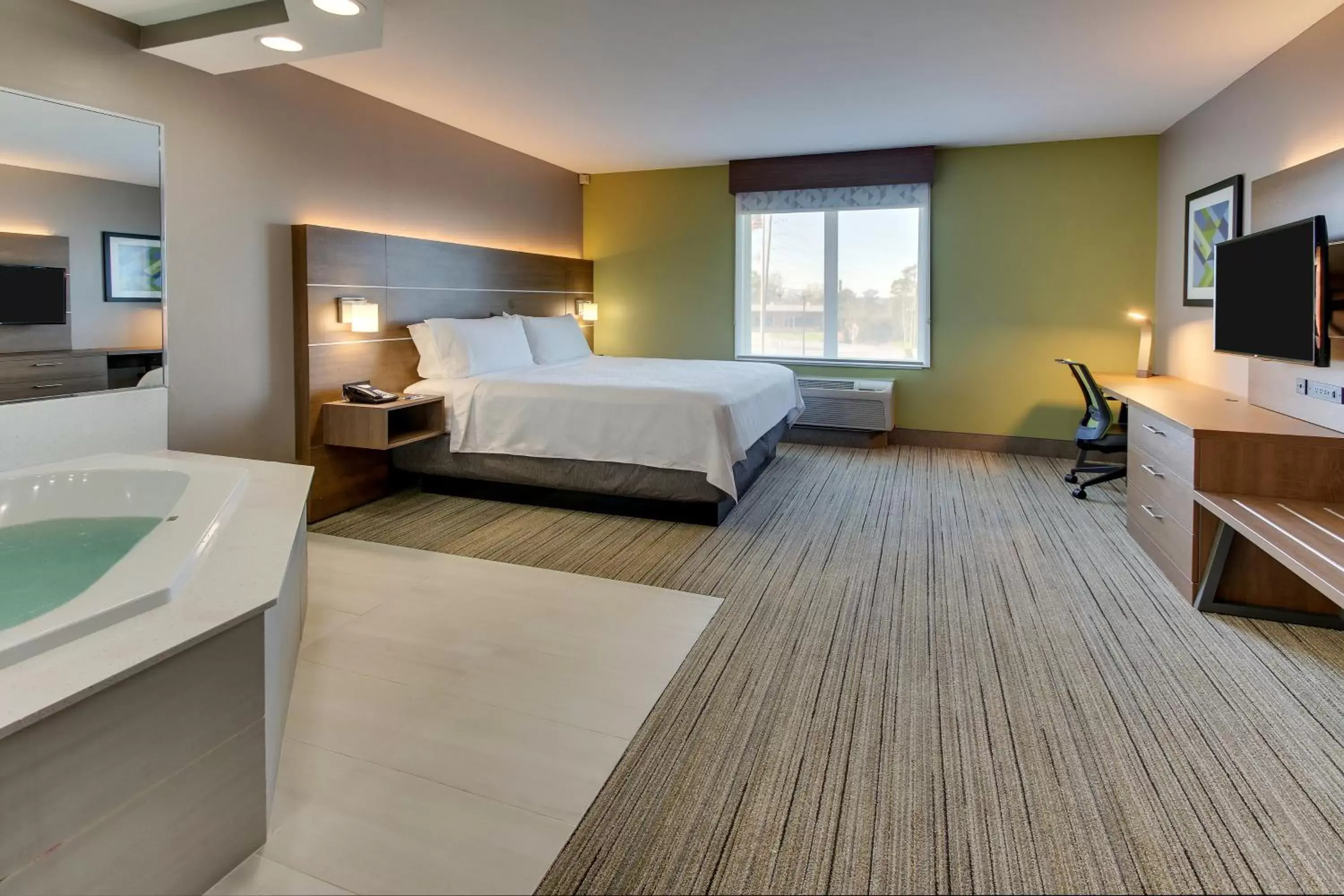 Bedroom in Holiday Inn Express Hotel & Suites Columbus-Fort Benning, an IHG Hotel