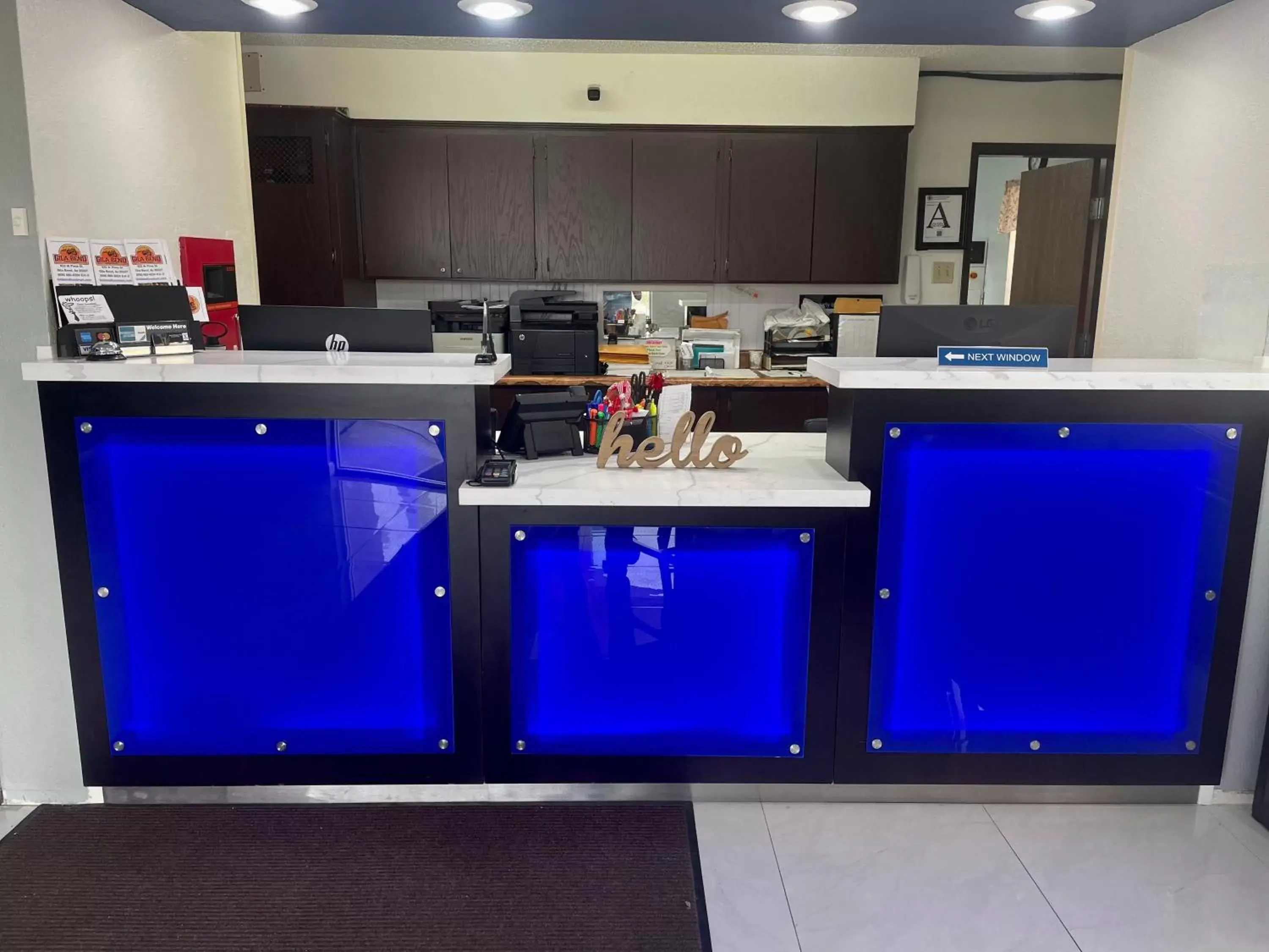 Lobby or reception, Kitchen/Kitchenette in Americas Choice Inn & Suites