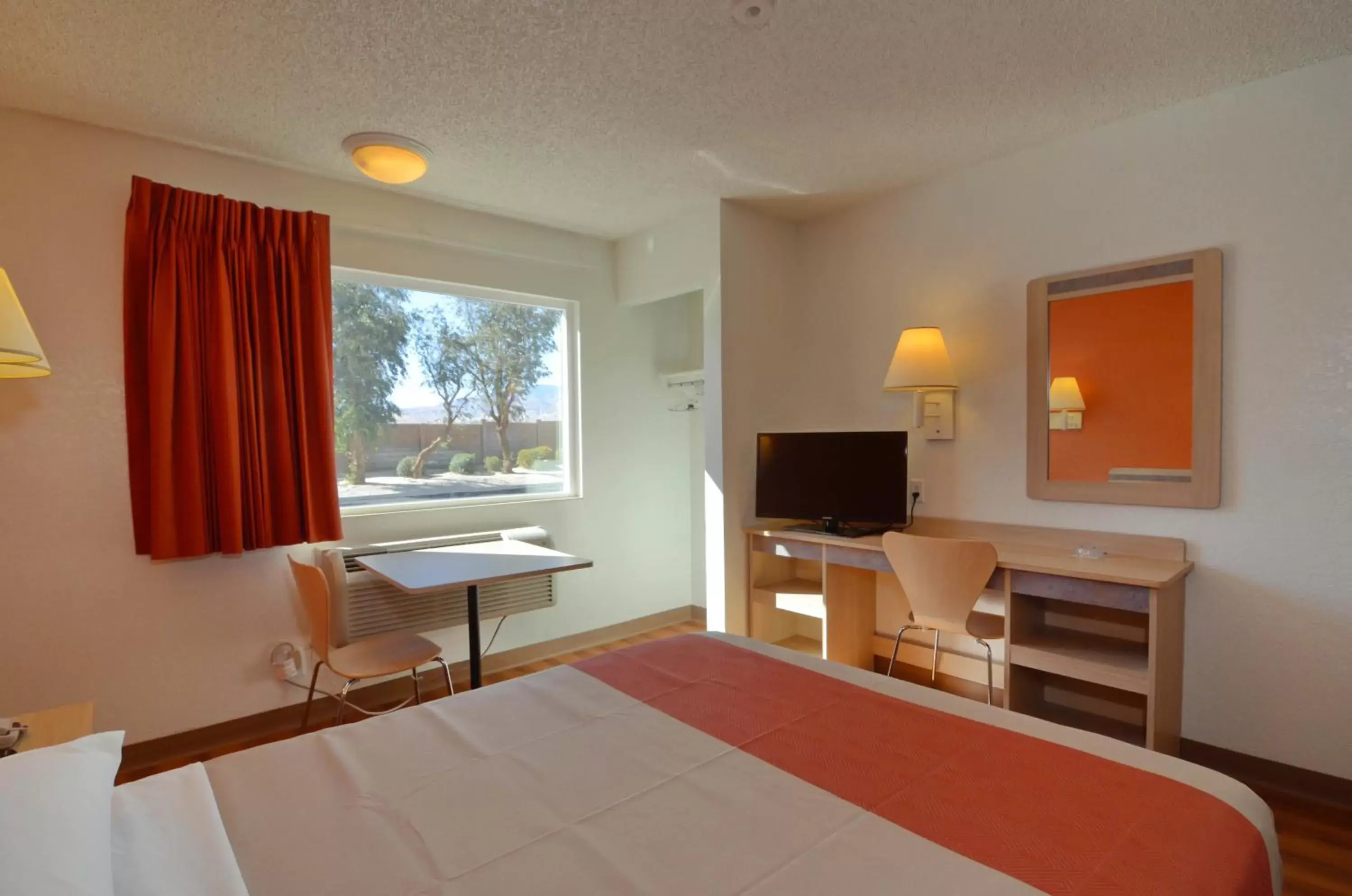 Bedroom, TV/Entertainment Center in Motel 6-North Palm Springs, CA - North