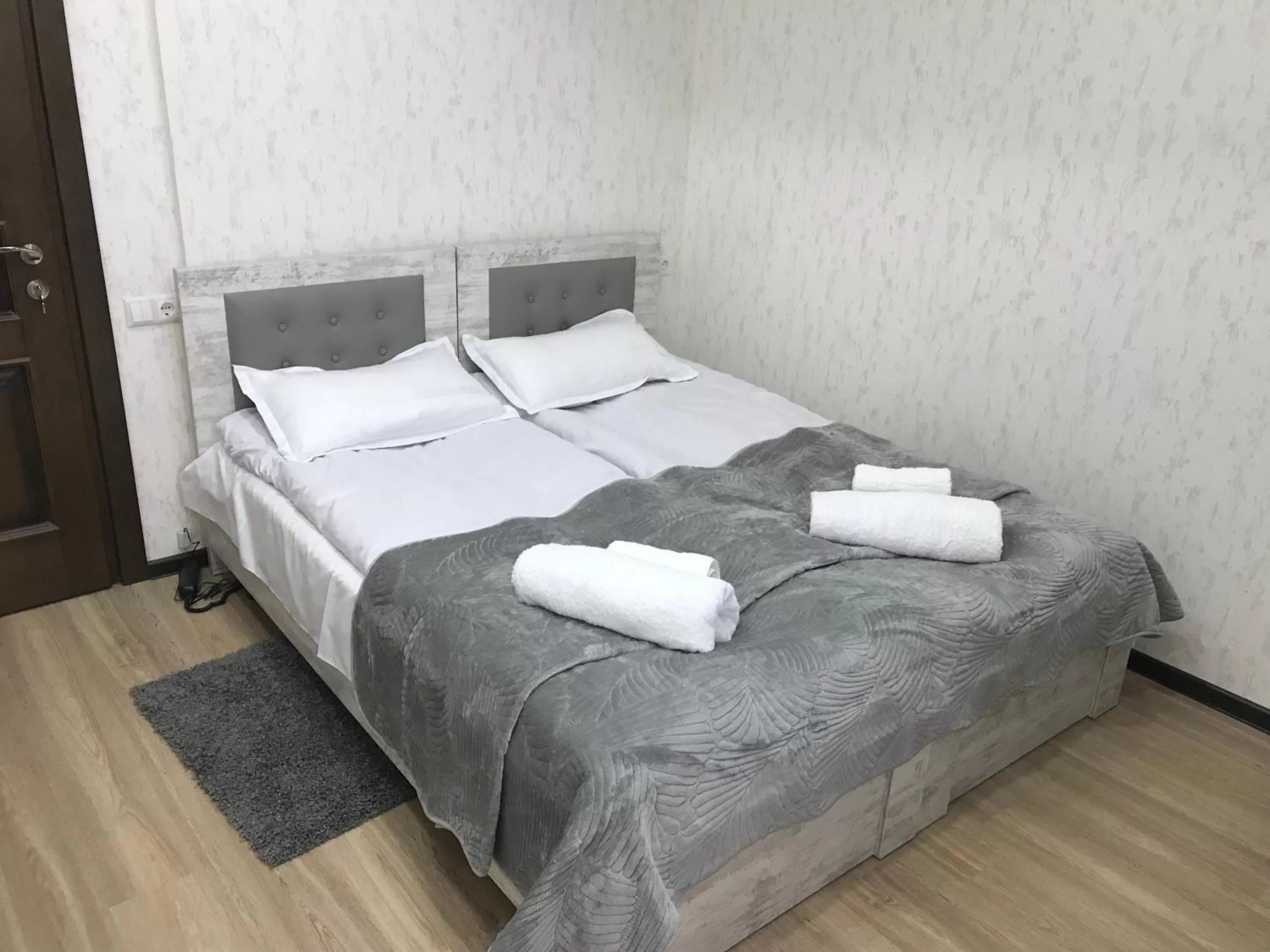 Bed in Gamarjoba Hotel