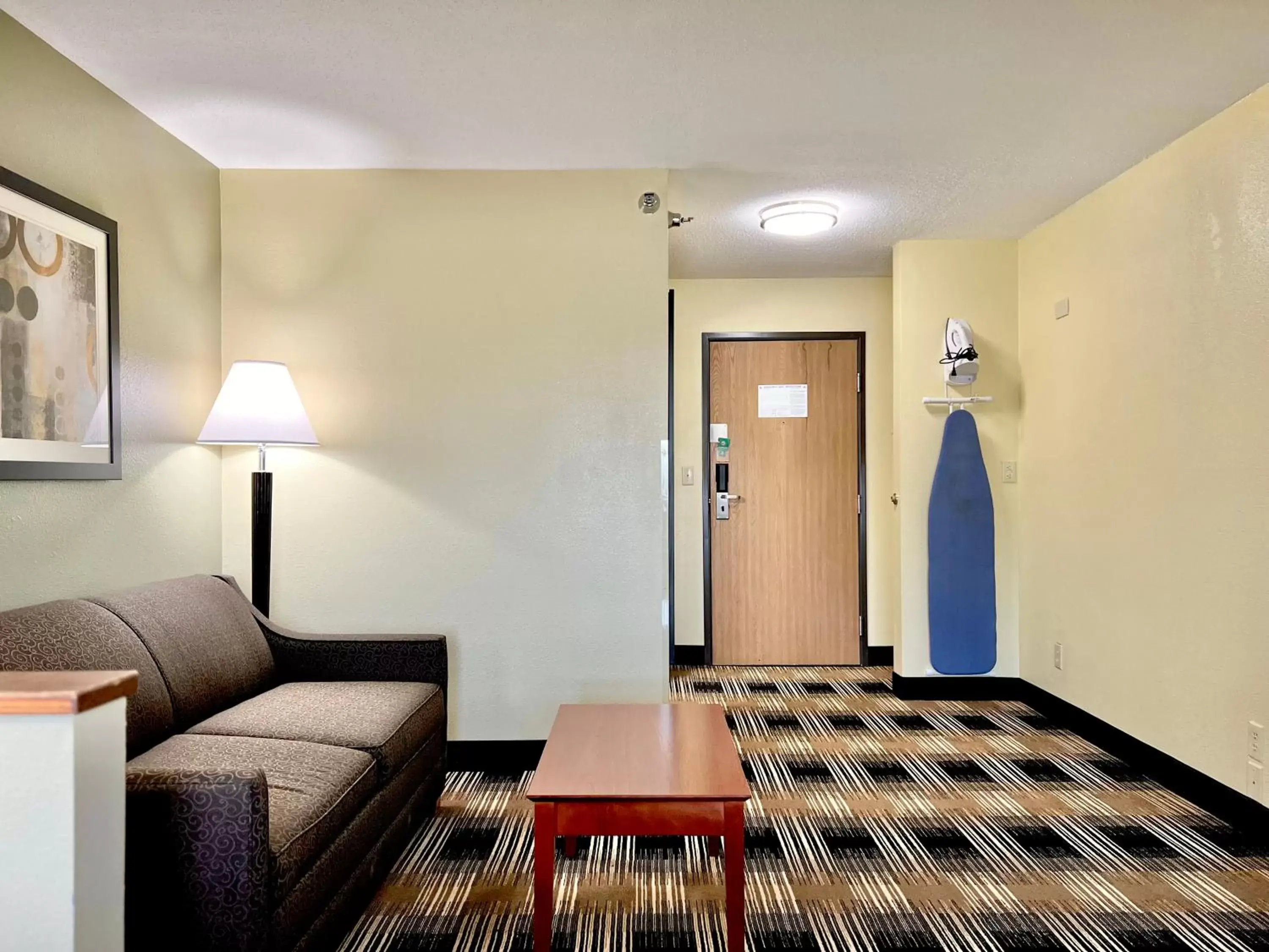 Bedroom, Seating Area in Quality Inn & Suites