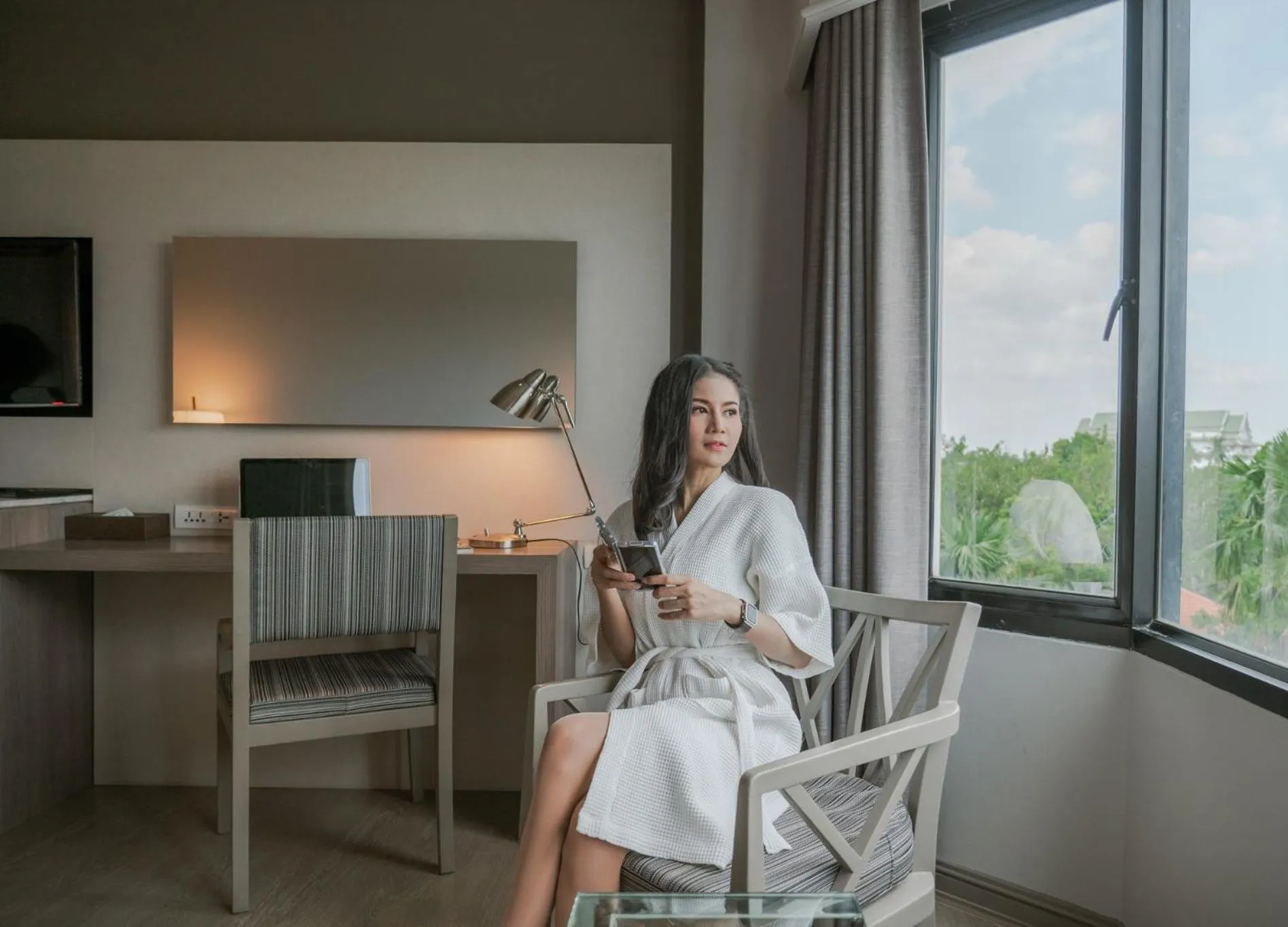 Bedroom in The Grand Riverside Hotel