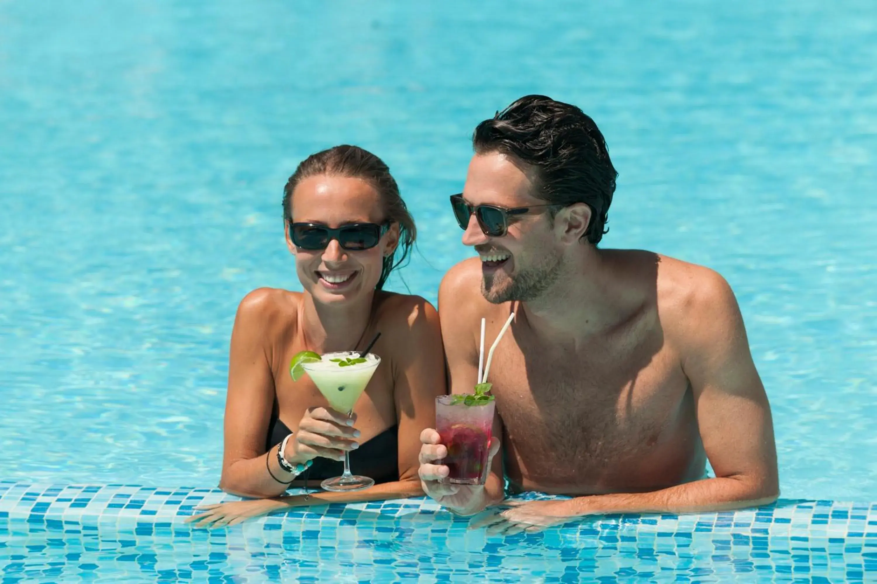 People, Swimming Pool in Caravel Bike Hotel