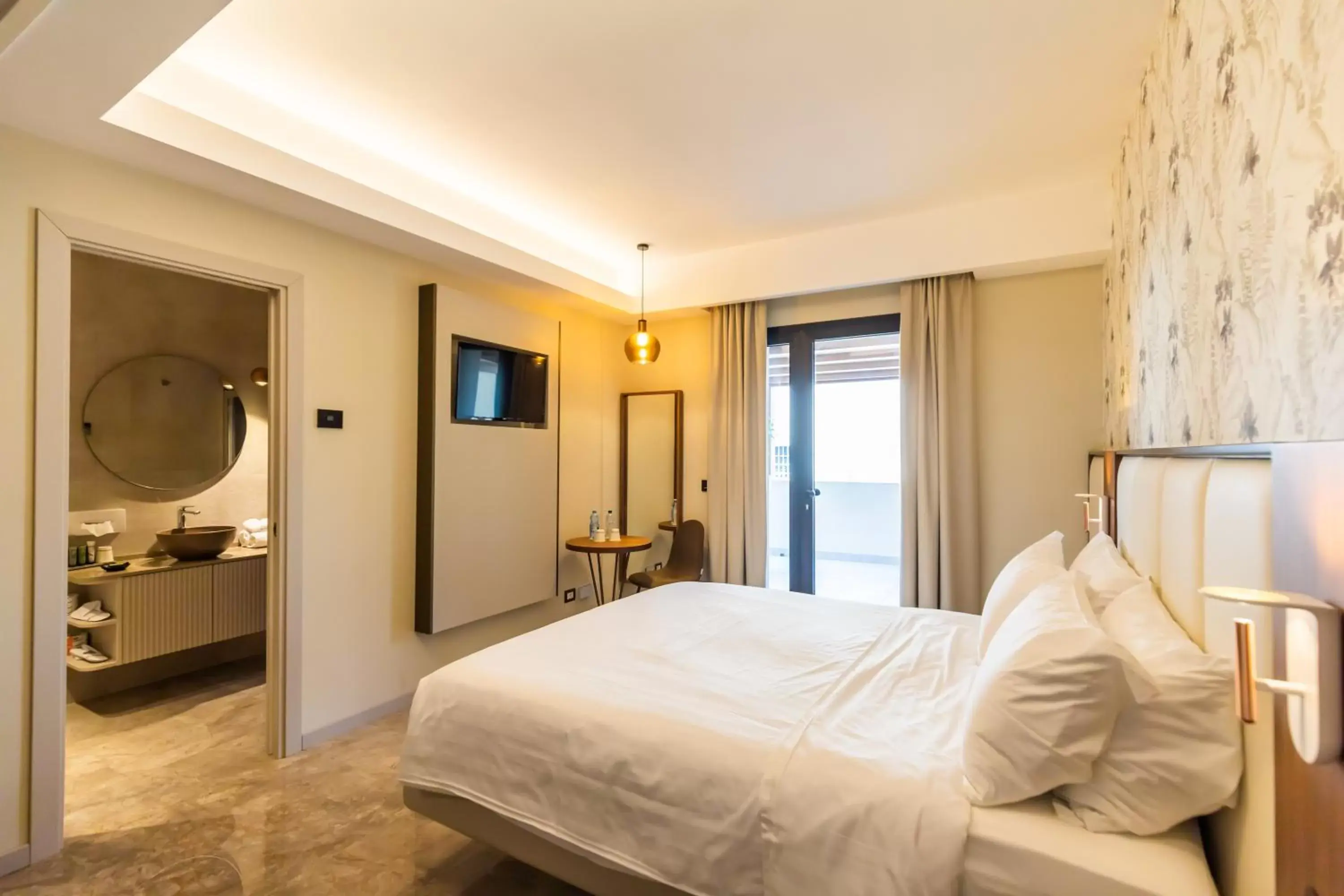 Bed in Solmaris Tropea Rooms & Suites