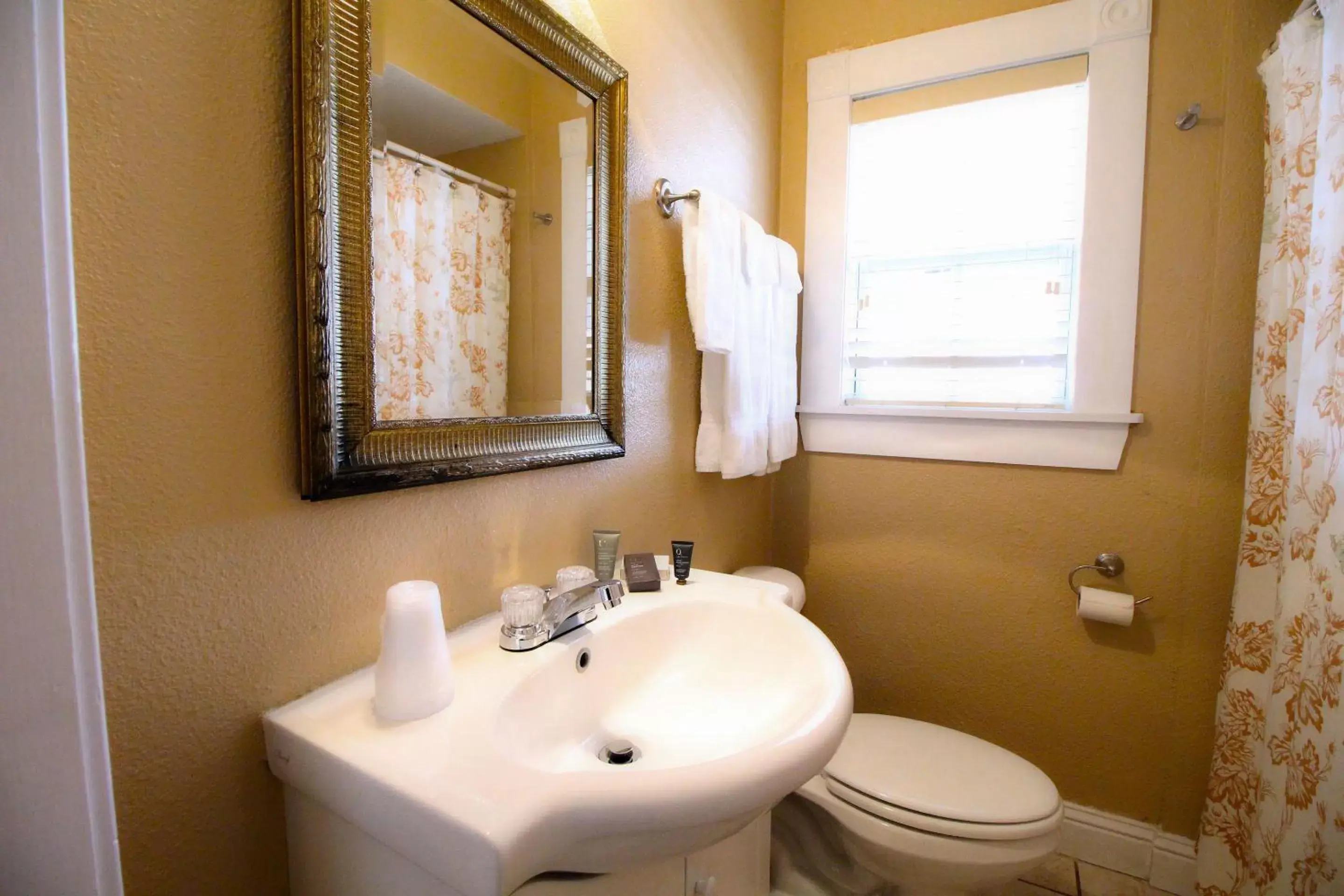 Bathroom in Peach Tree Inn & Suites