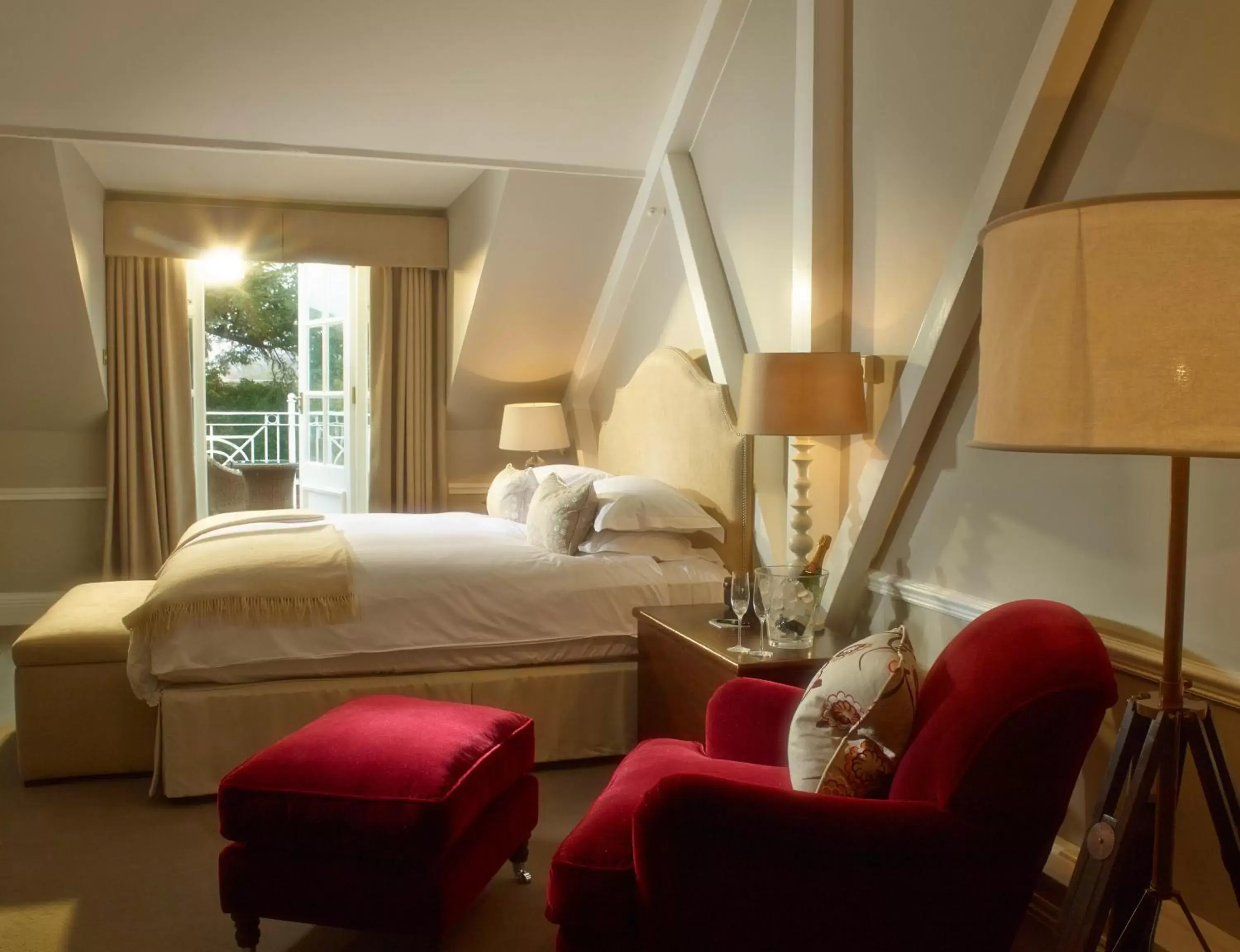 Bedroom, Seating Area in Chewton Glen Hotel - an Iconic Luxury Hotel