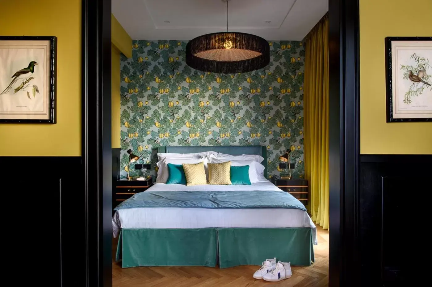 Bed in Velona's Jungle Luxury Suites