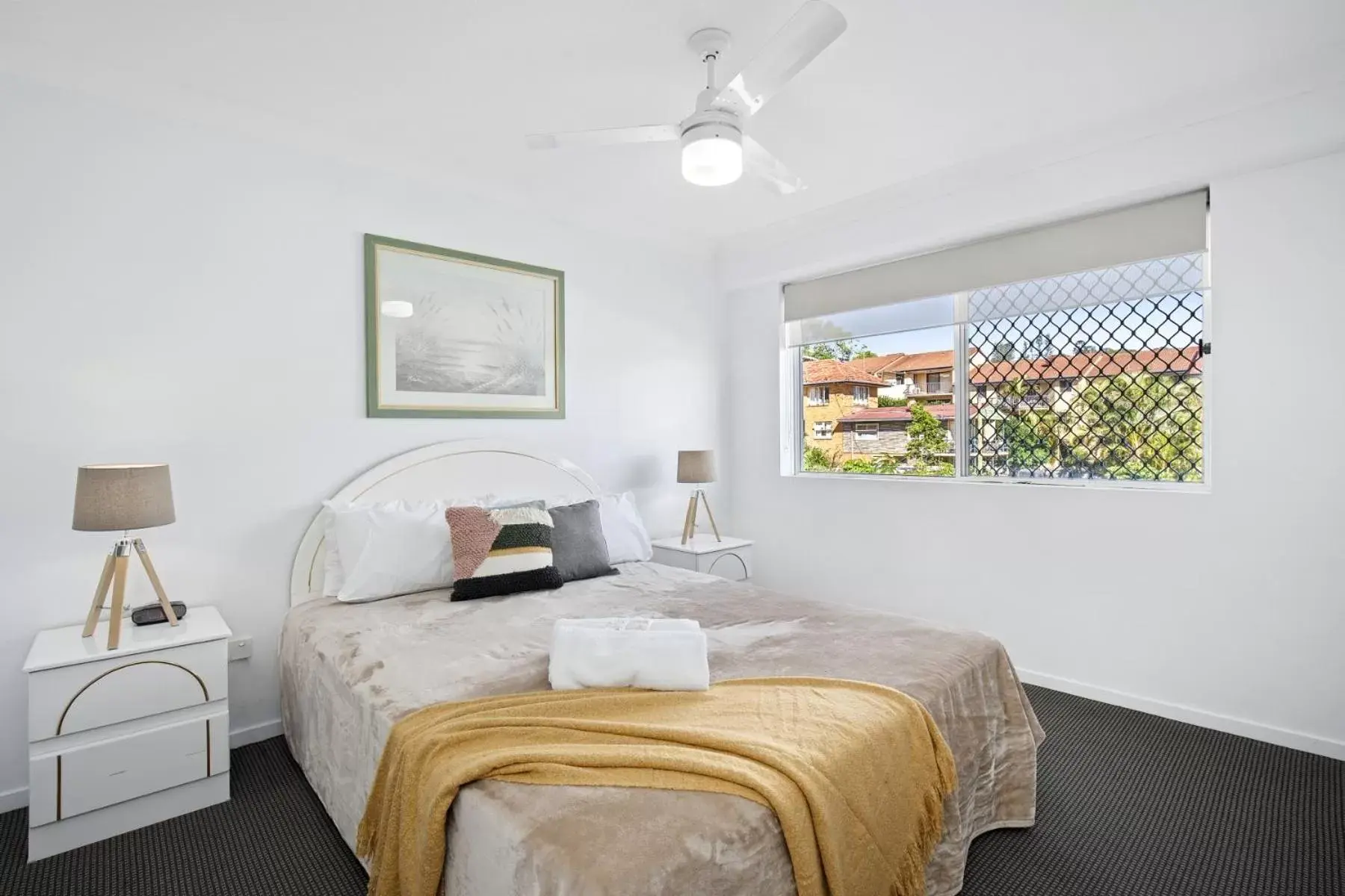 Bed in Kirra Palms Holiday Apartments