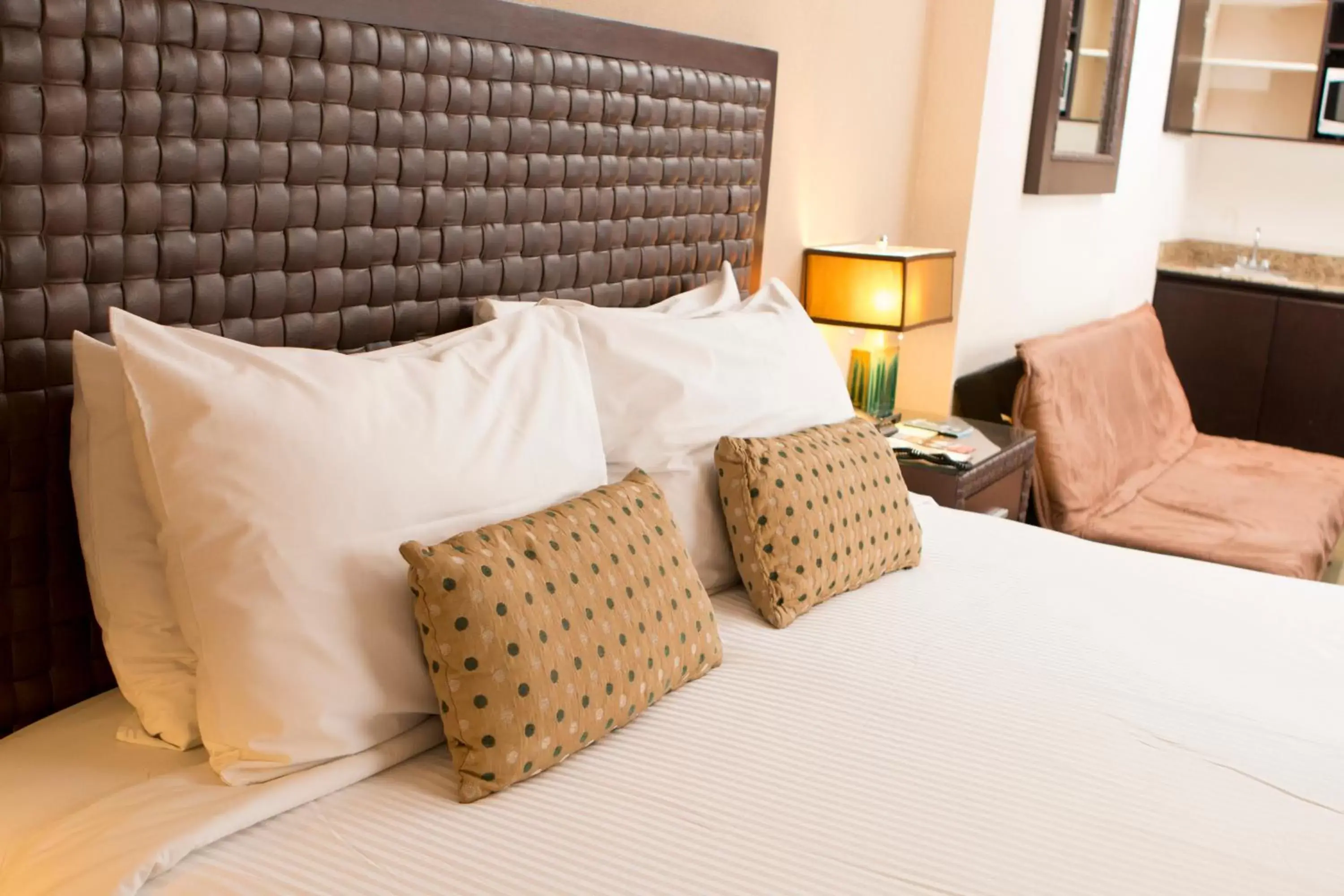 Bed in Rincon del Valle Hotel & Suites