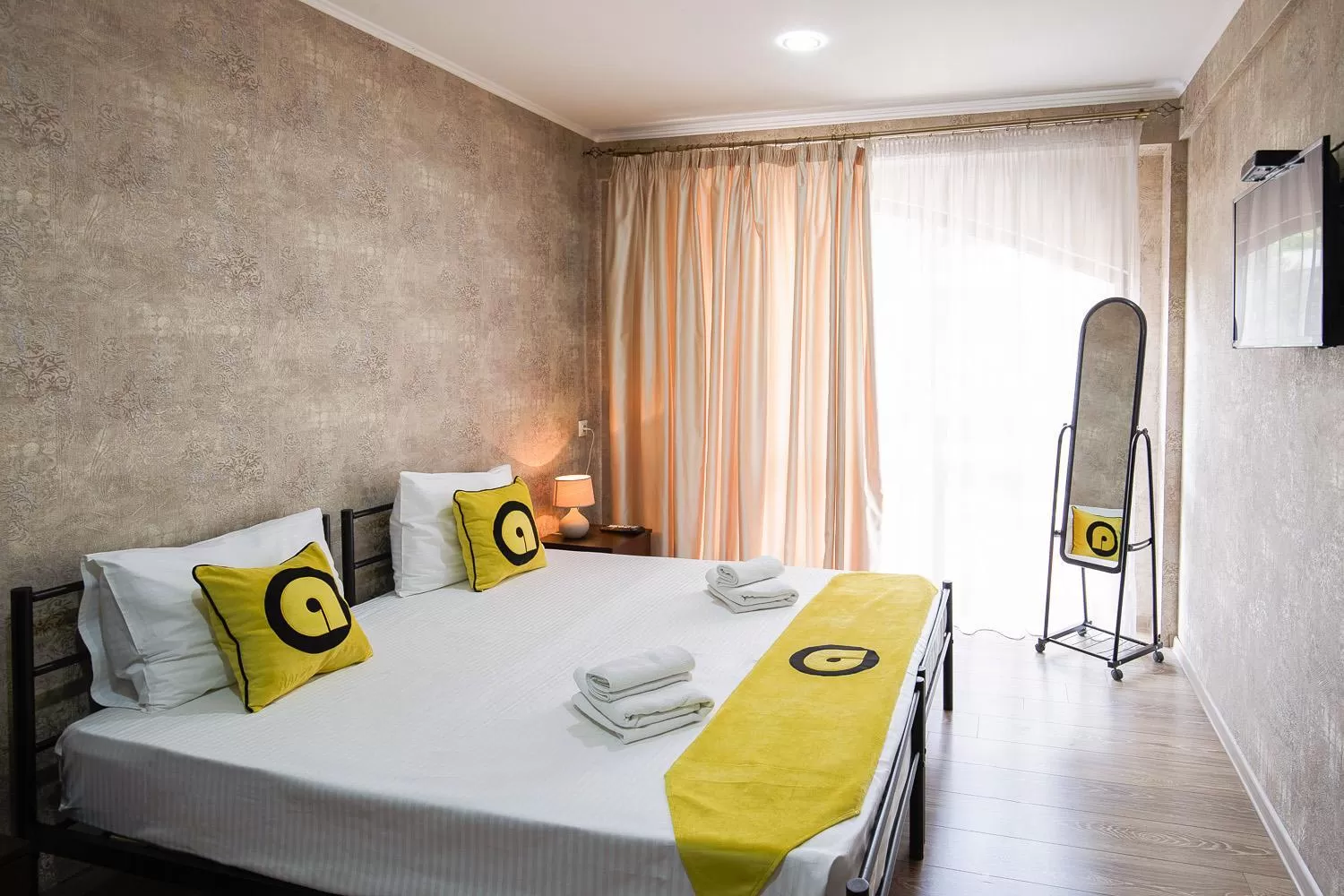 Bed in Aura Plaza Hotel