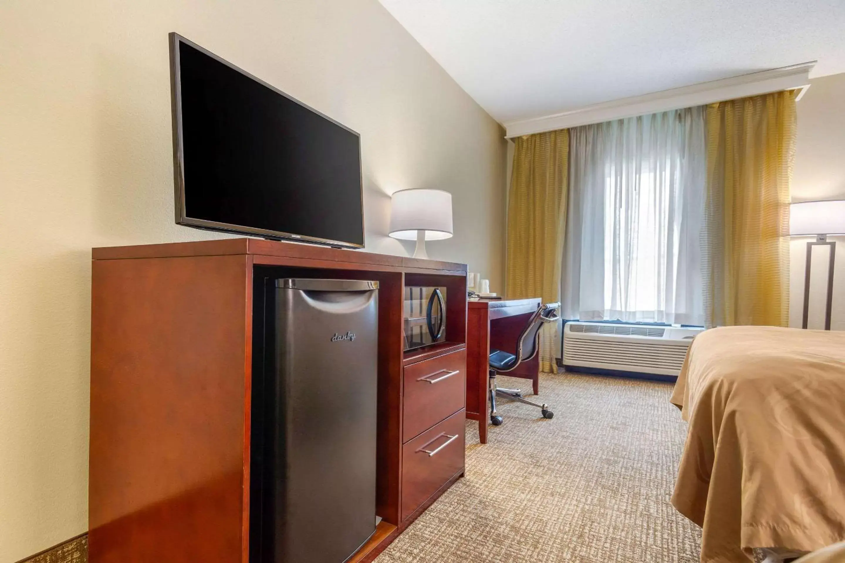 Photo of the whole room, TV/Entertainment Center in Quality Inn & Suites Olde Town