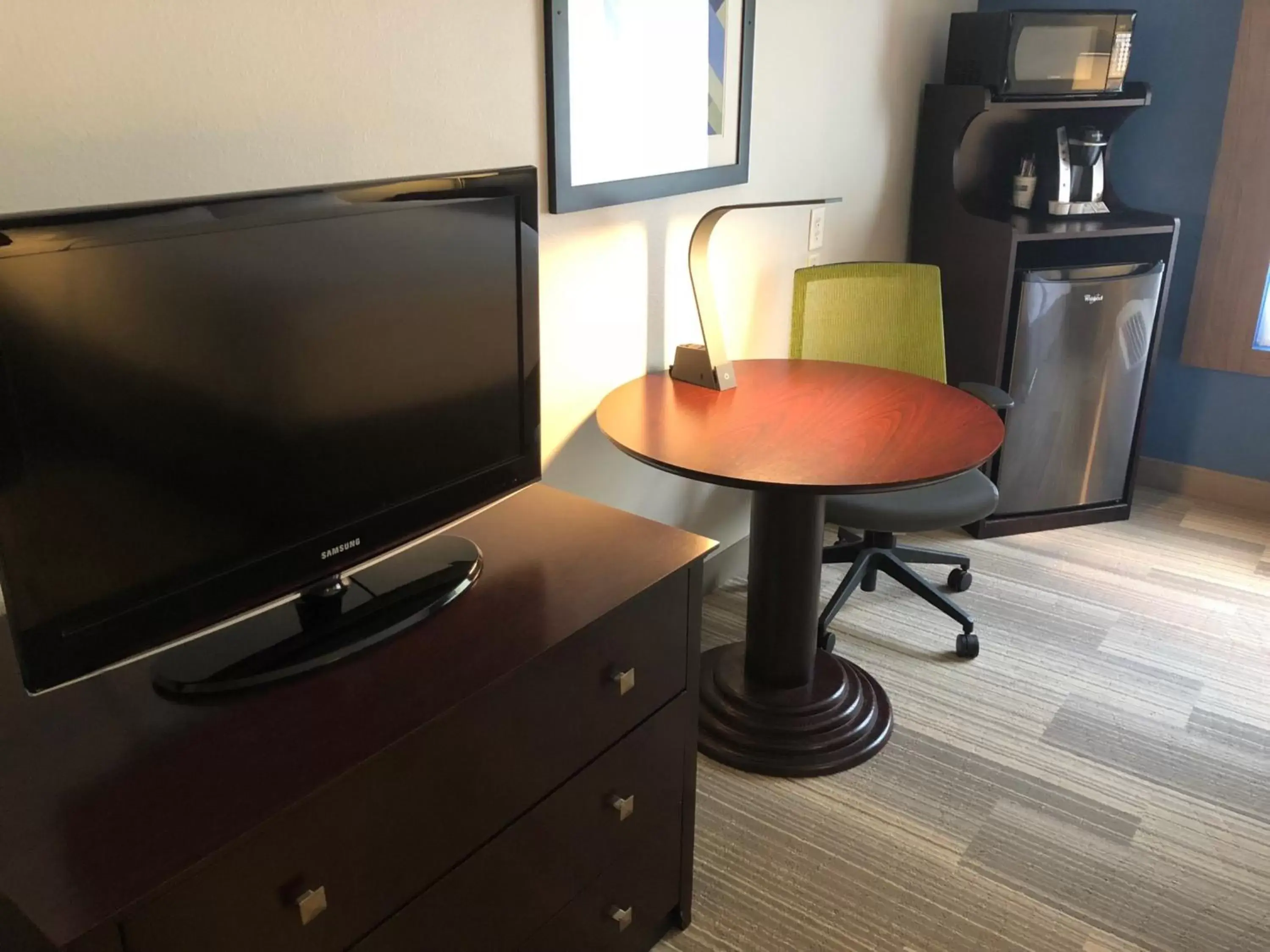 Photo of the whole room, TV/Entertainment Center in Holiday Inn Express Dayton, an IHG Hotel