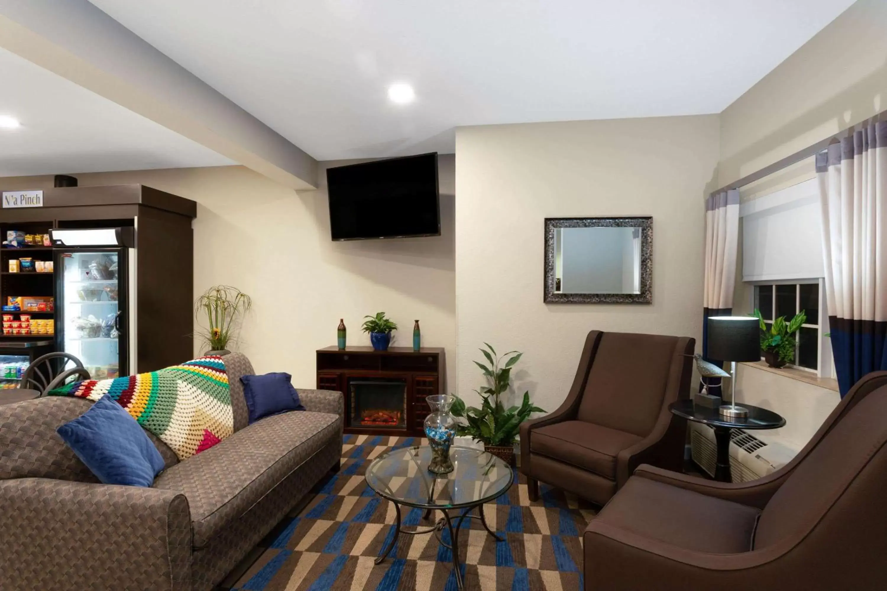 Lobby or reception, Seating Area in Microtel Inn & Suites by Wyndham Brooksville