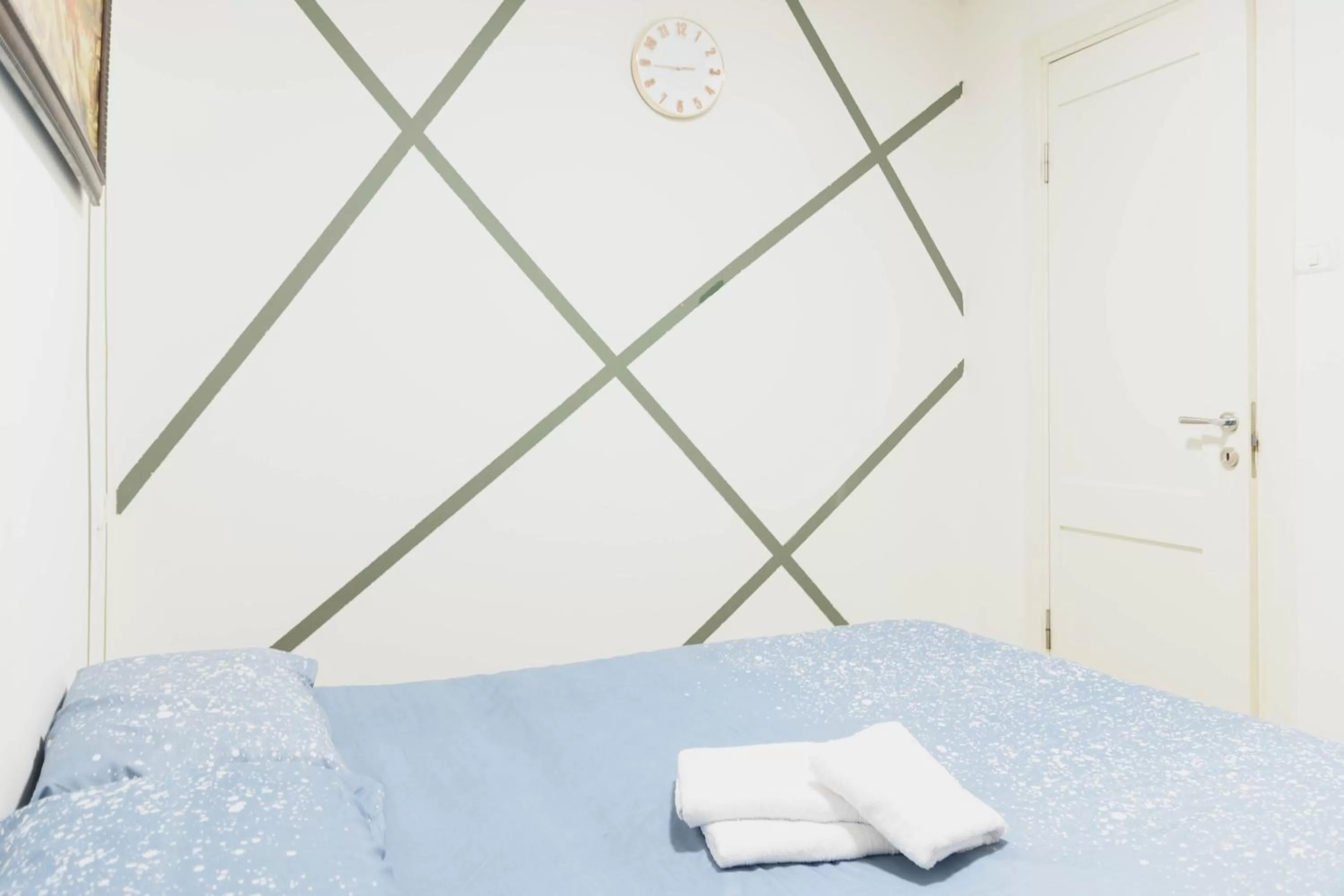 Bed in Central Laguardia Hotel