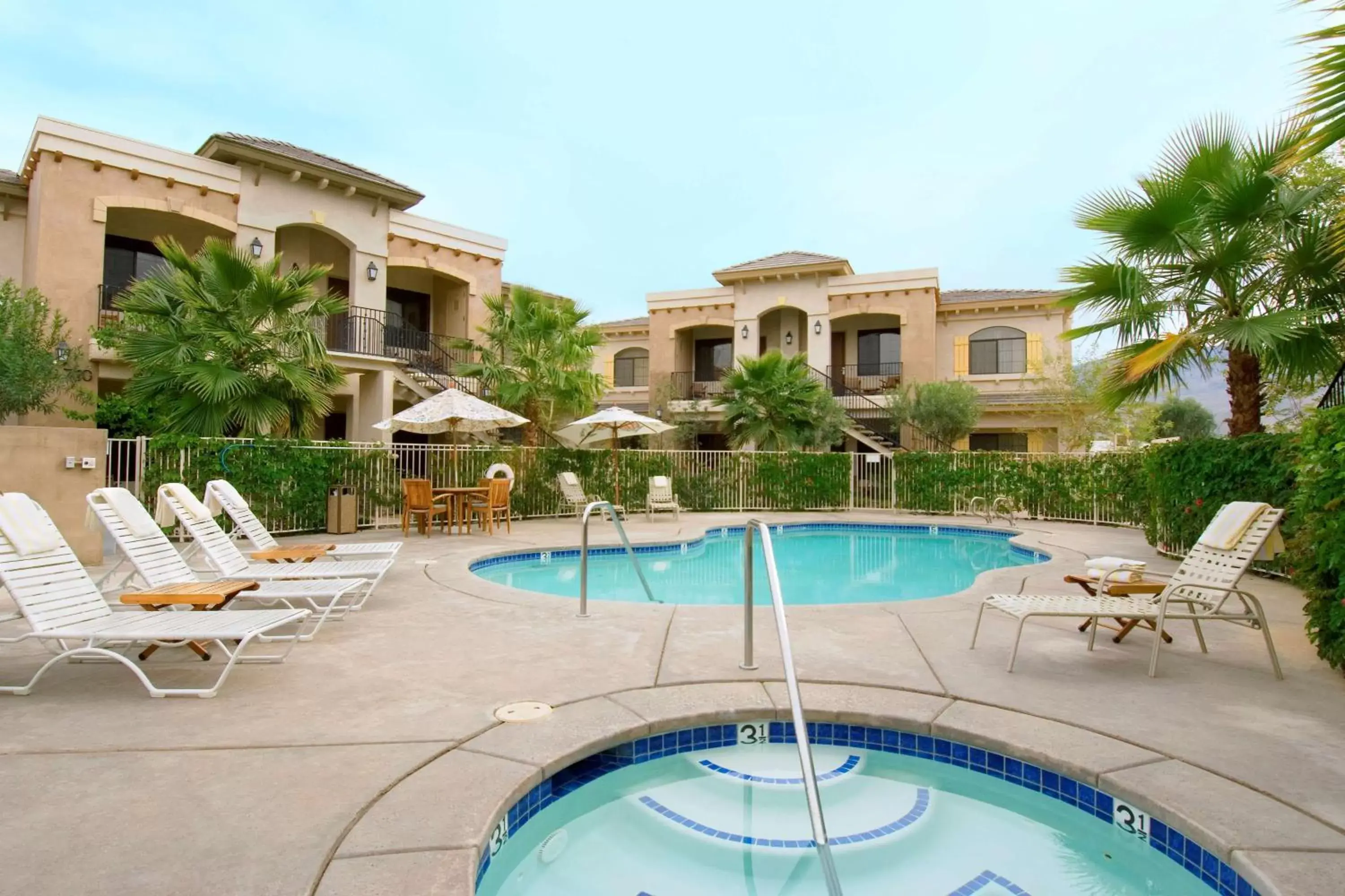 Bed, Swimming Pool in Embassy Suites La Quinta Hotel & Spa