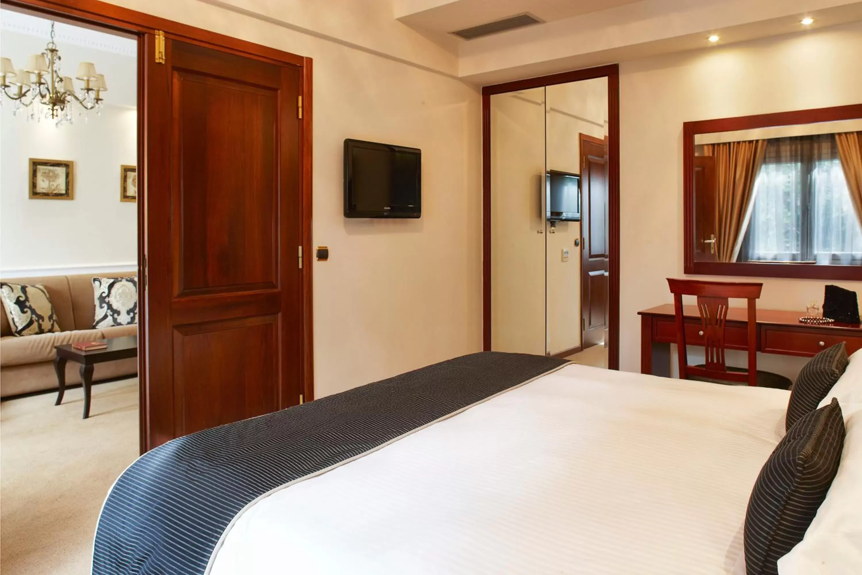 Bed in Ava Hotel and Suites