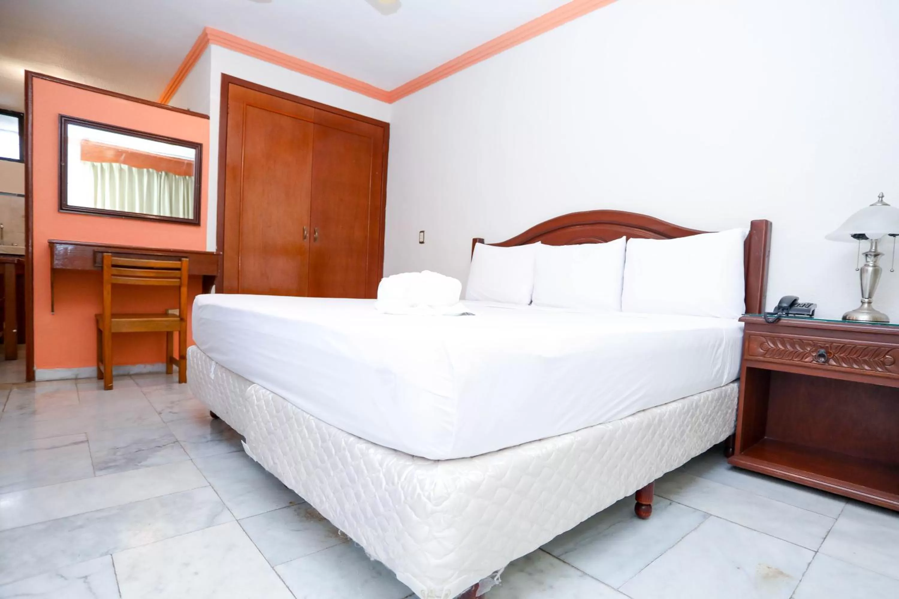 Bed in Hotel Avenida Cancun