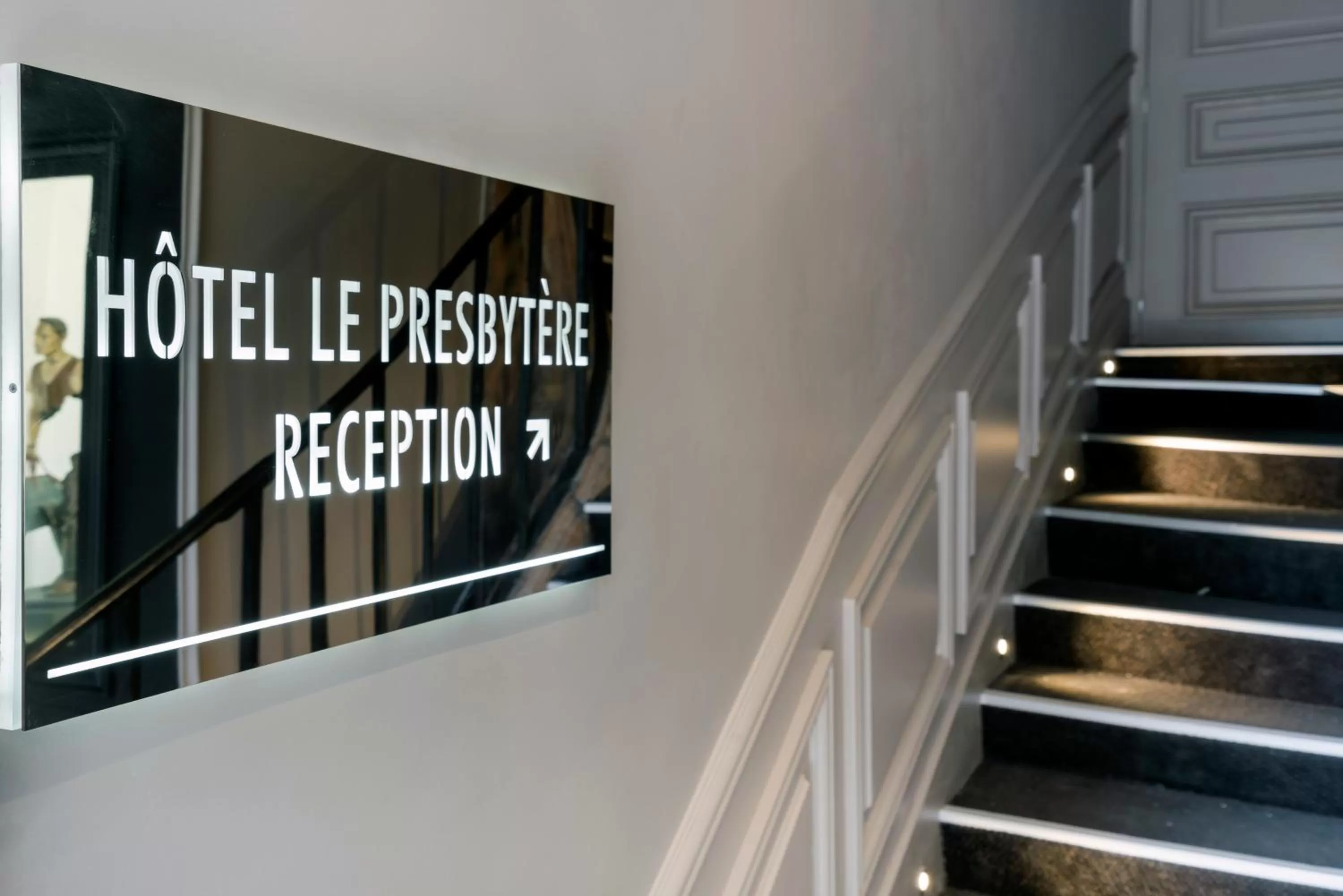 Property logo or sign in Hôtel Le Presbytère