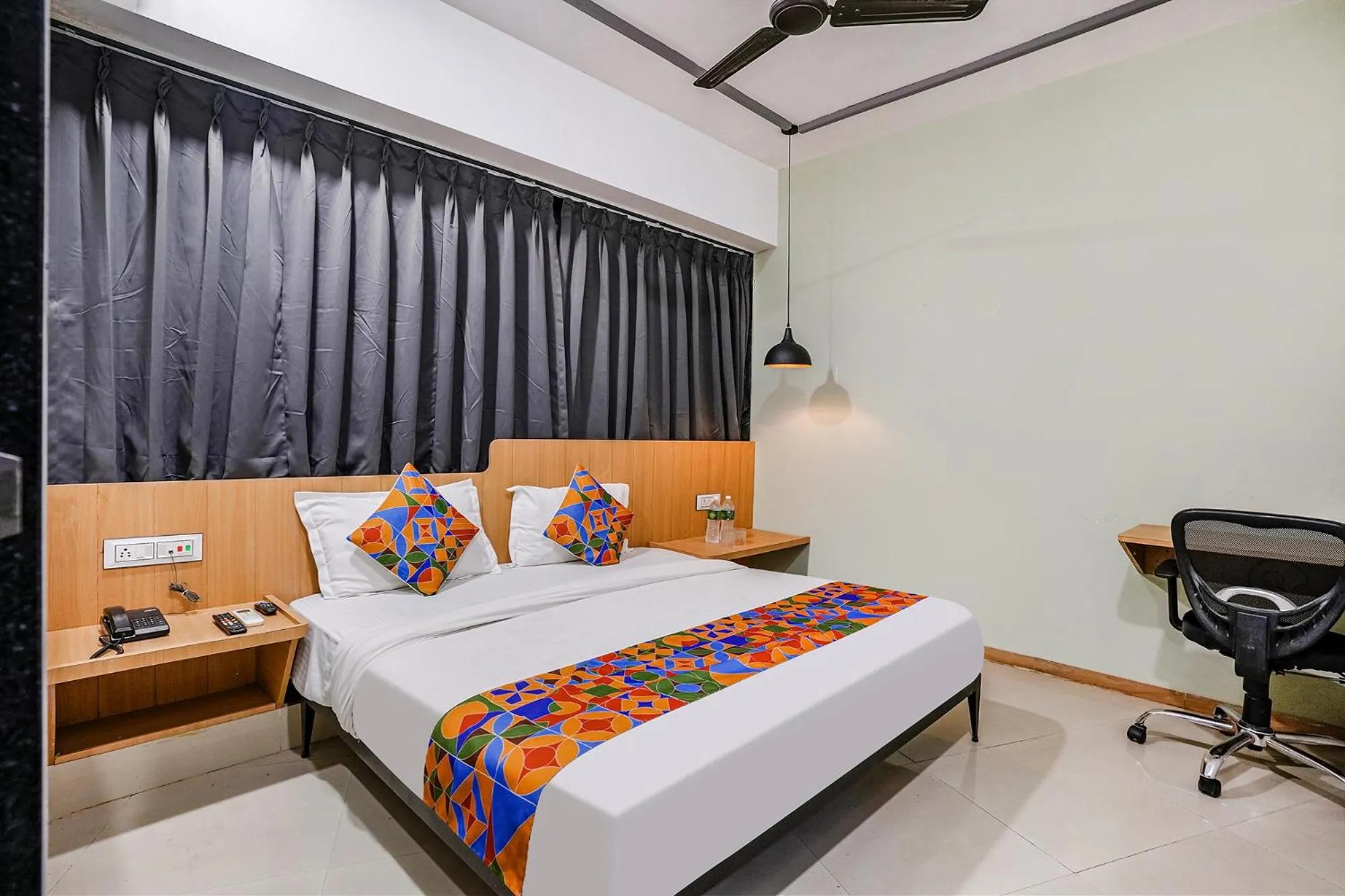 Bedroom in FabHotel Saarthi Inn