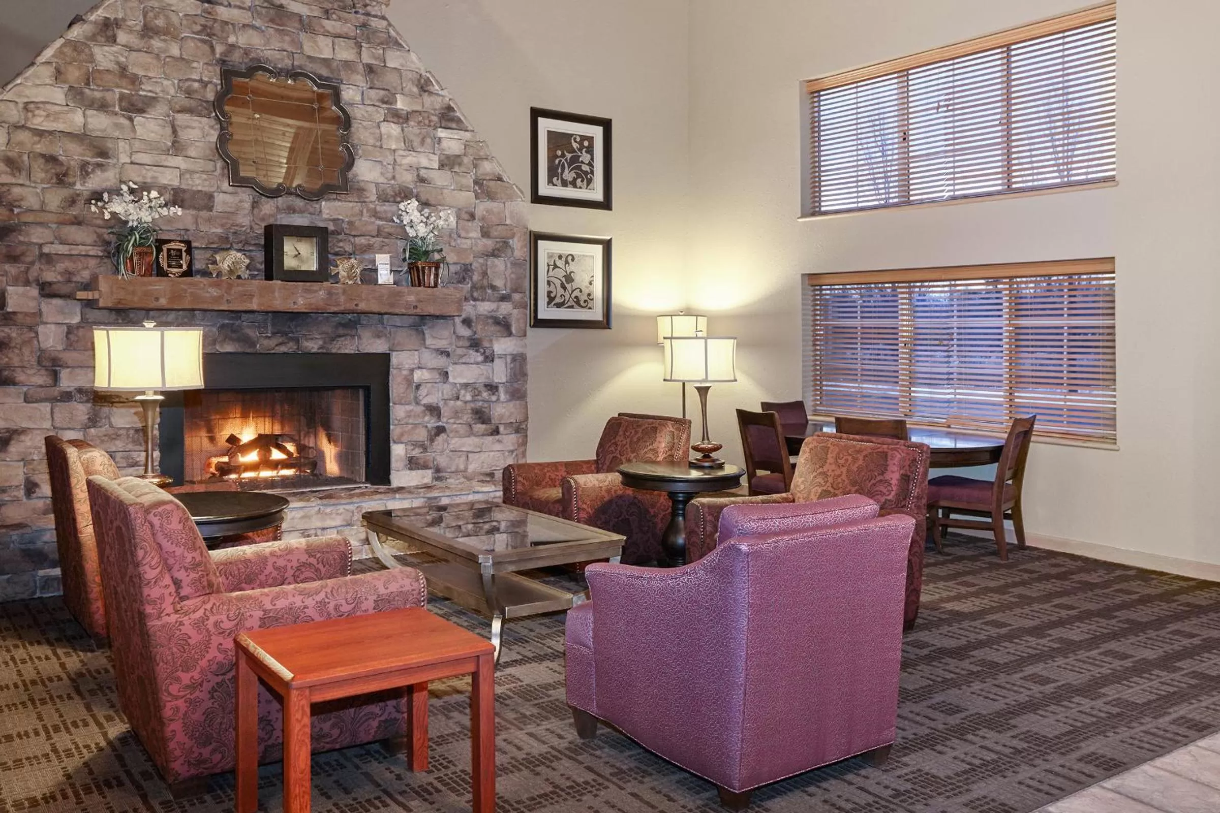 Seating area in AmericInn by Wyndham Douglas/Saugatuck