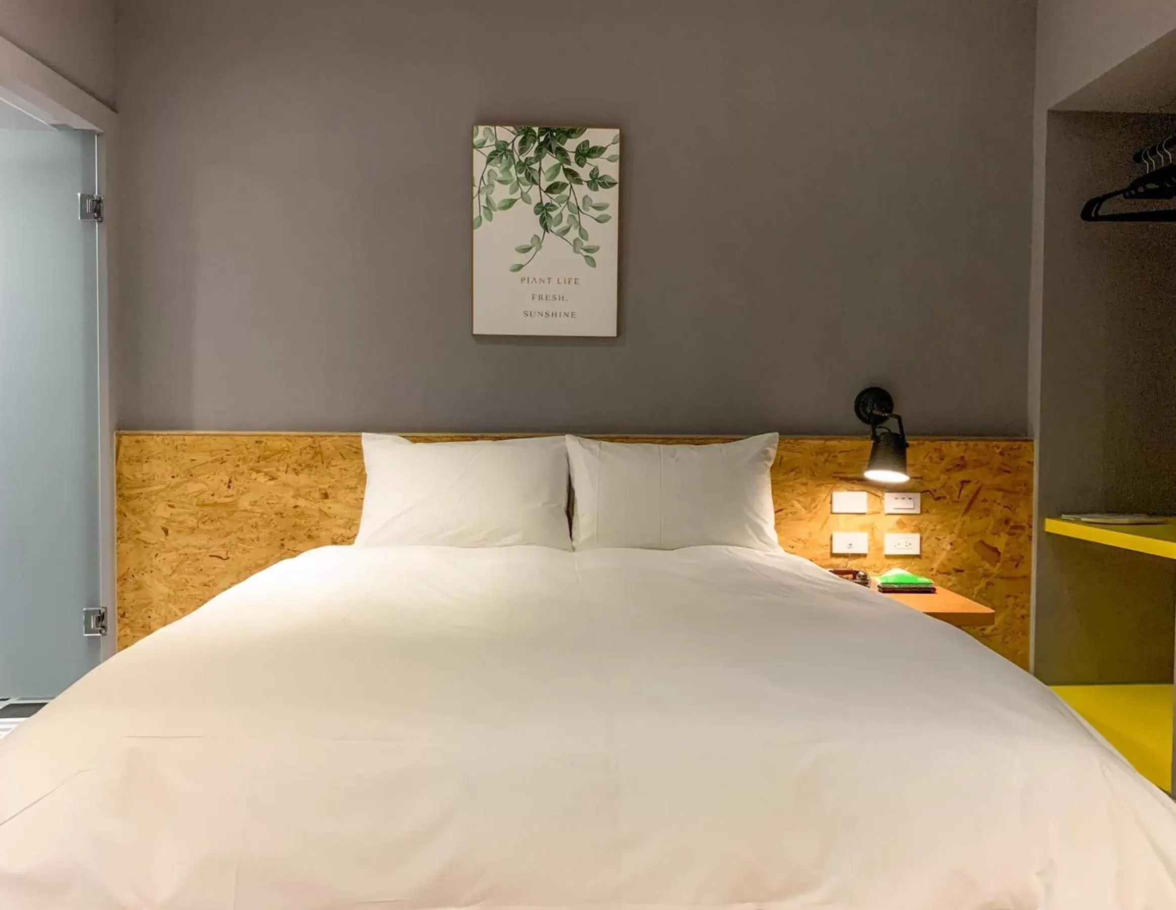 Bed in Raise Hotel Taichung