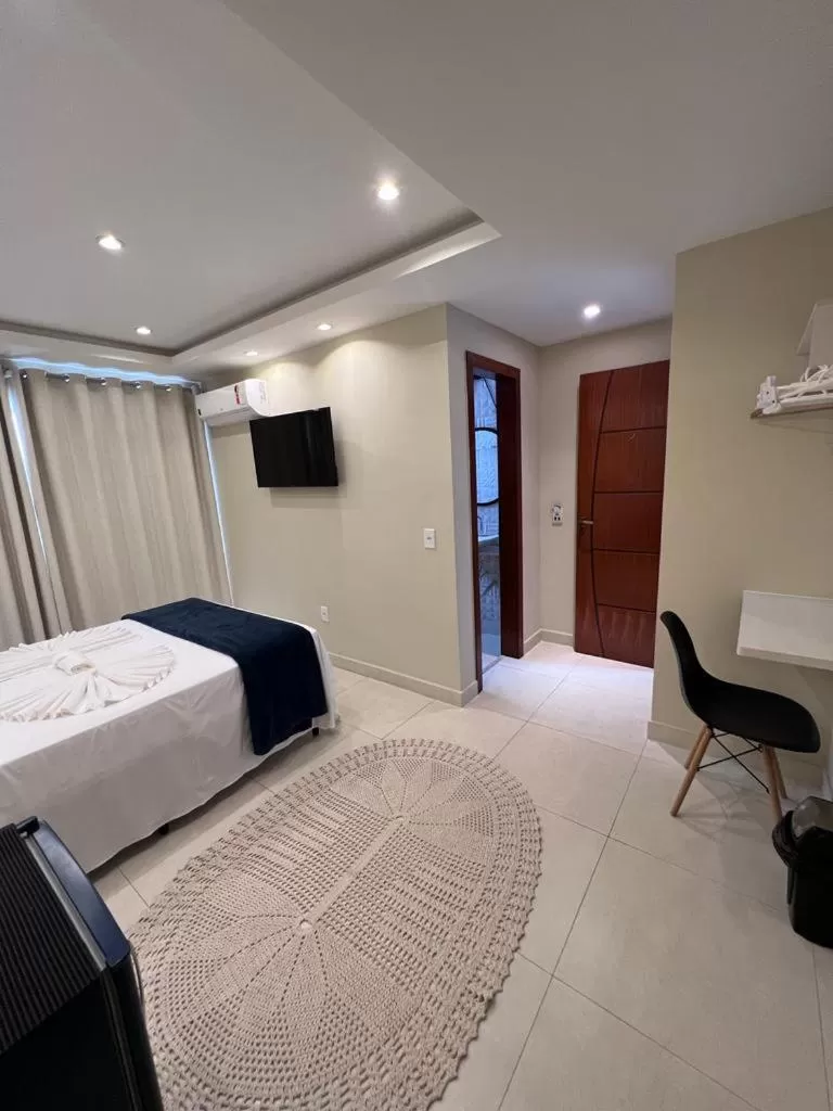 Bed in Pousada Arraial Tropical