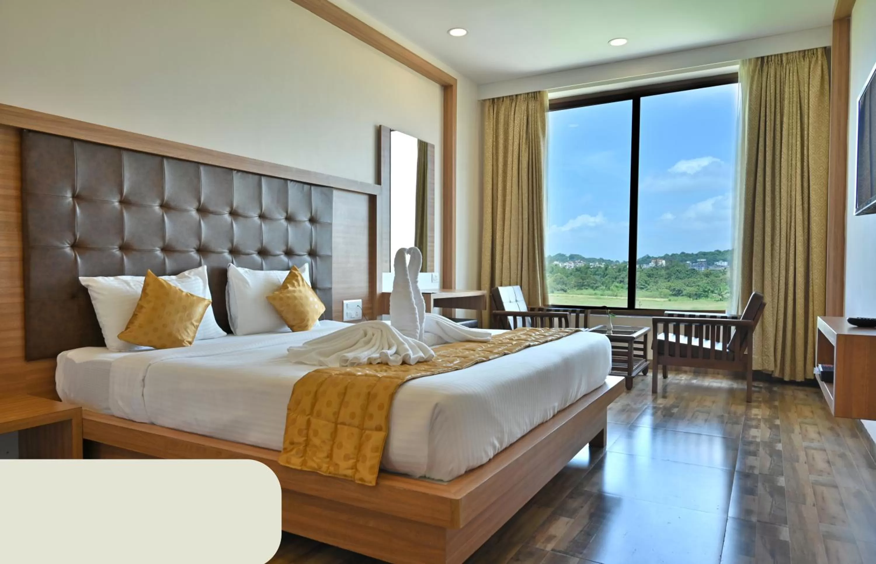 Bed in Hotel Laxmi Empire