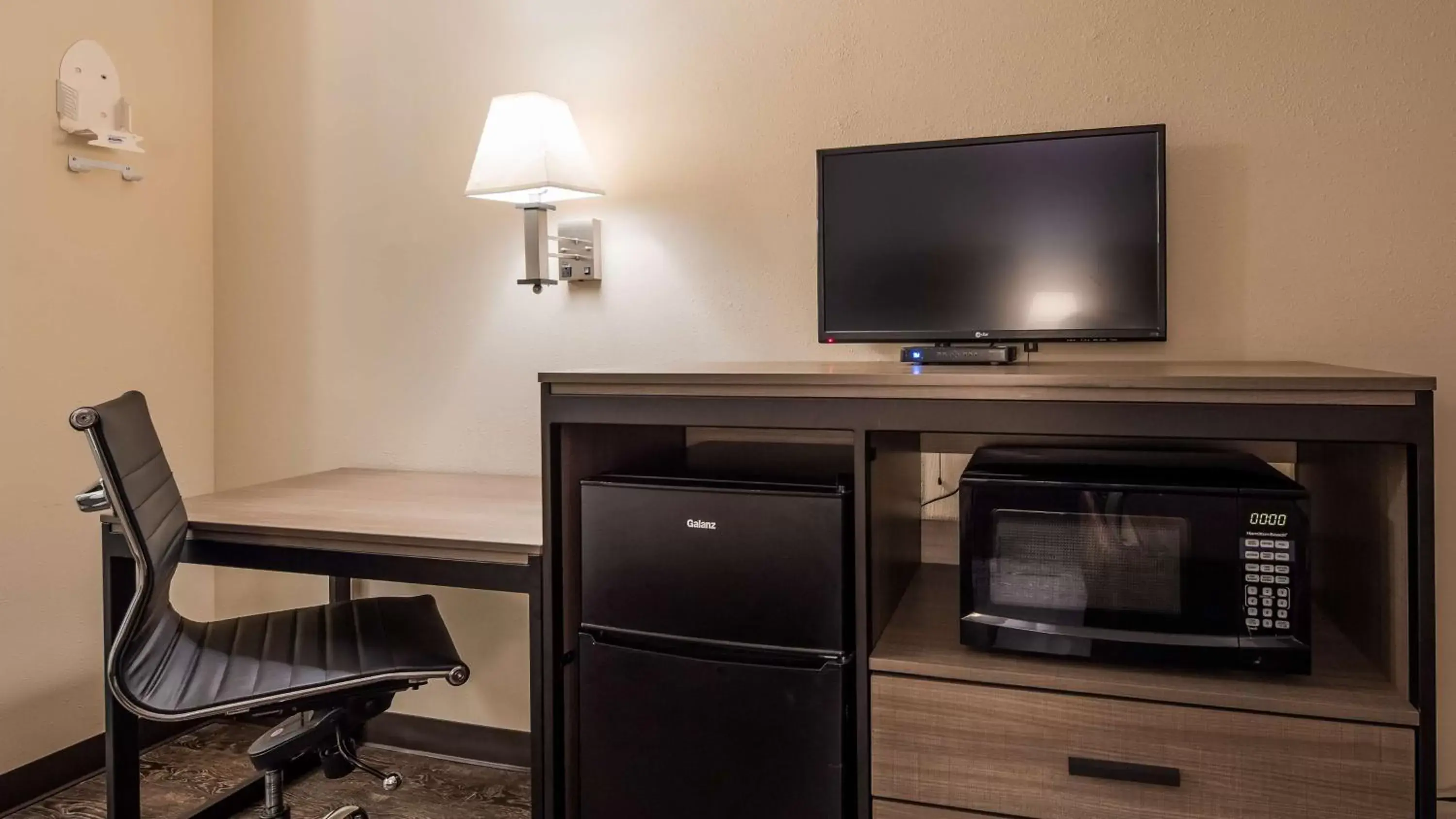 Photo of the whole room, TV/Entertainment Center in SureStay Hotel by Best Western Albuquerque Midtown