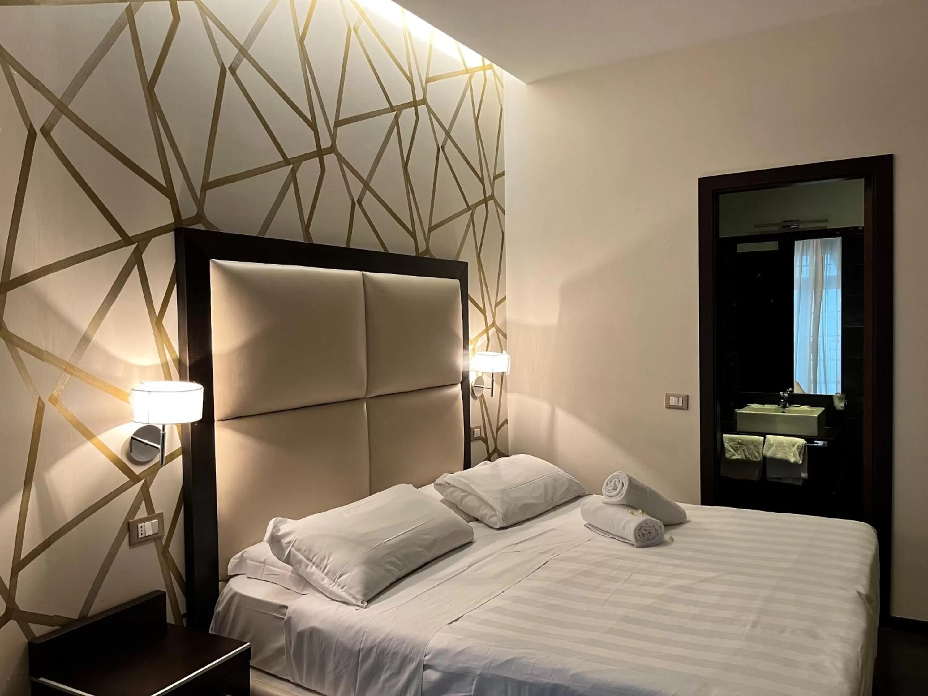 Bedroom in Catone District Hotel