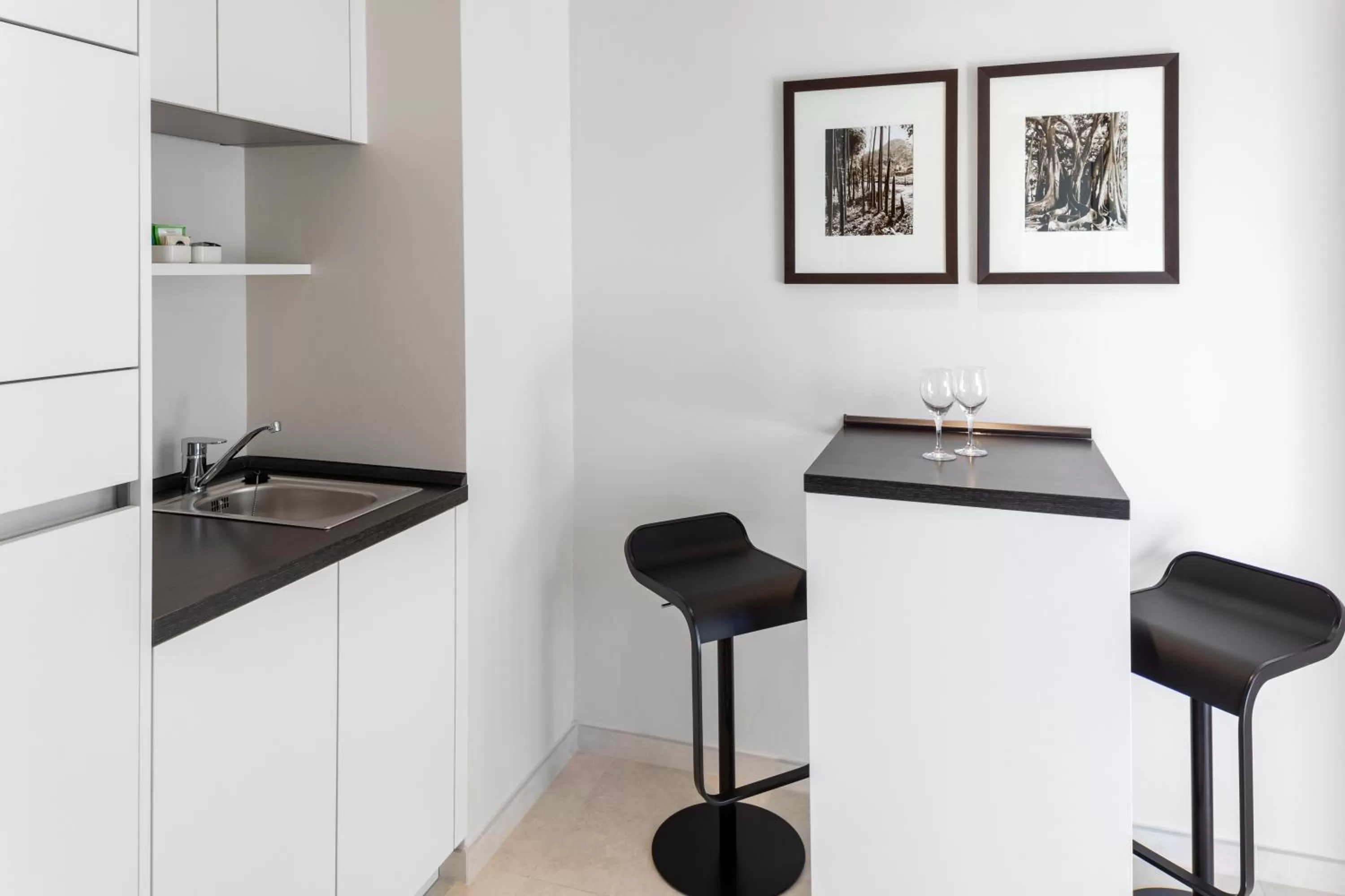 Kitchen or kitchenette in The Mandala Suites