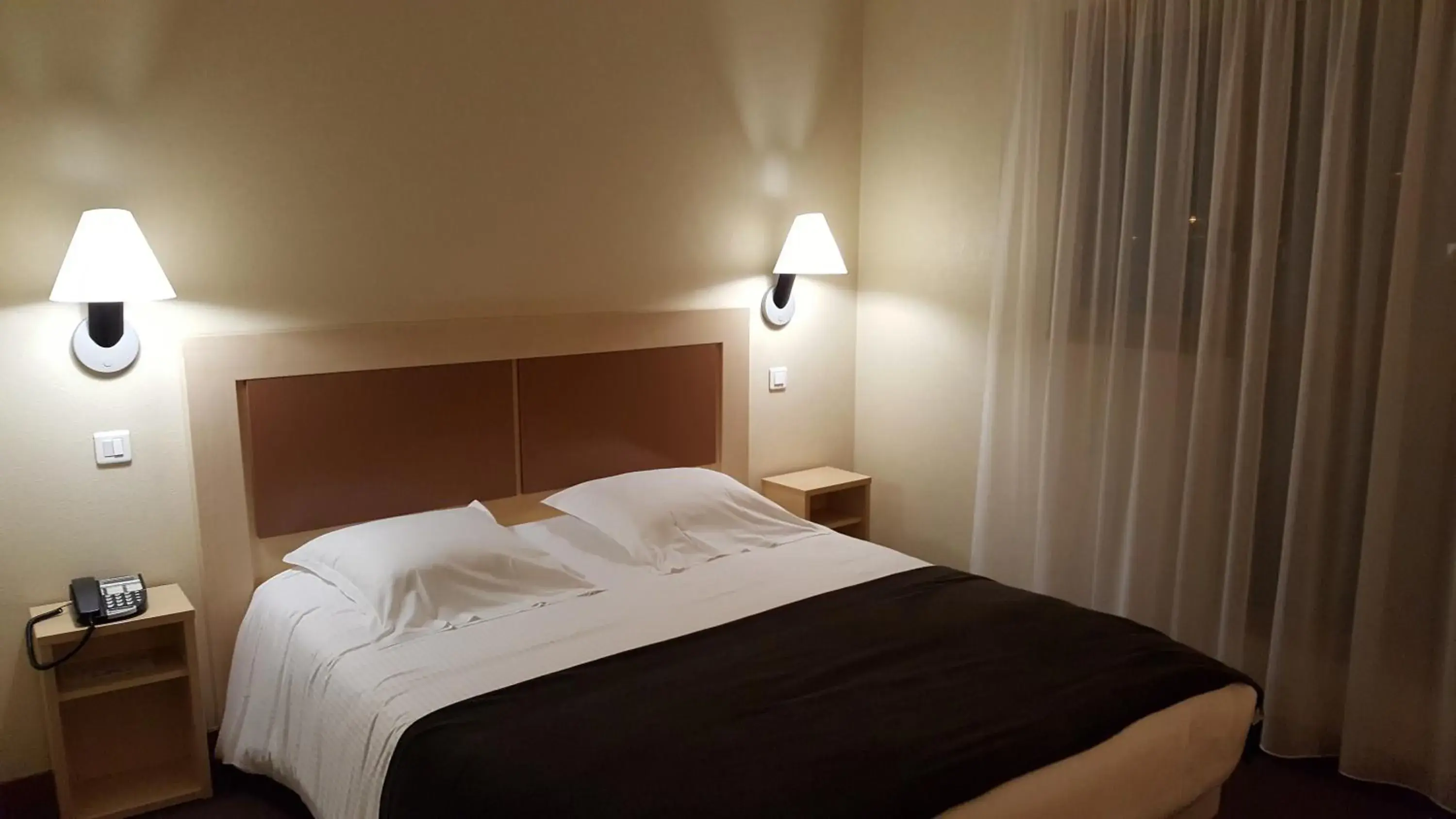 Bed in Hotel Talencia