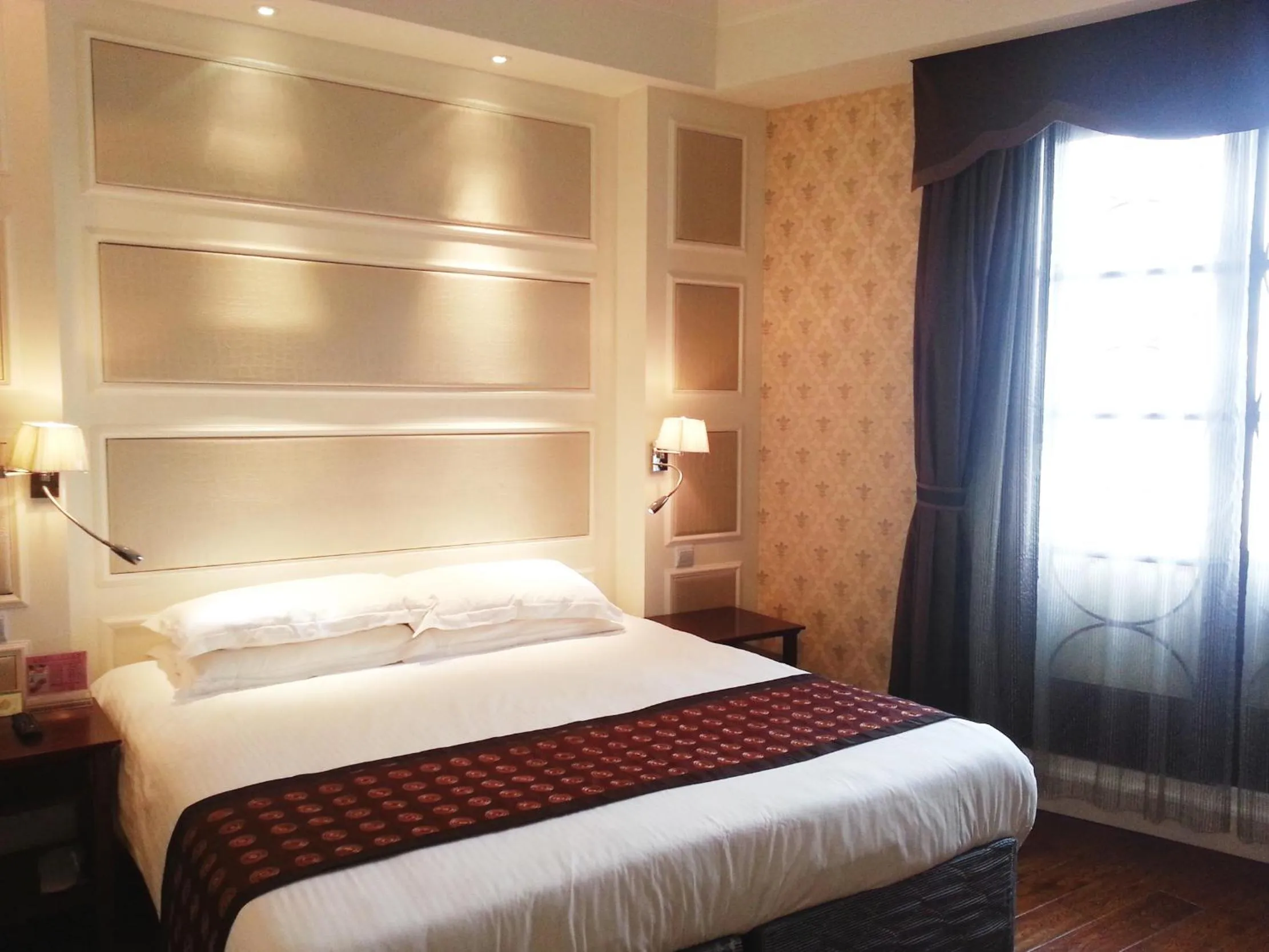 Bed in Seventh Heaven Hotel