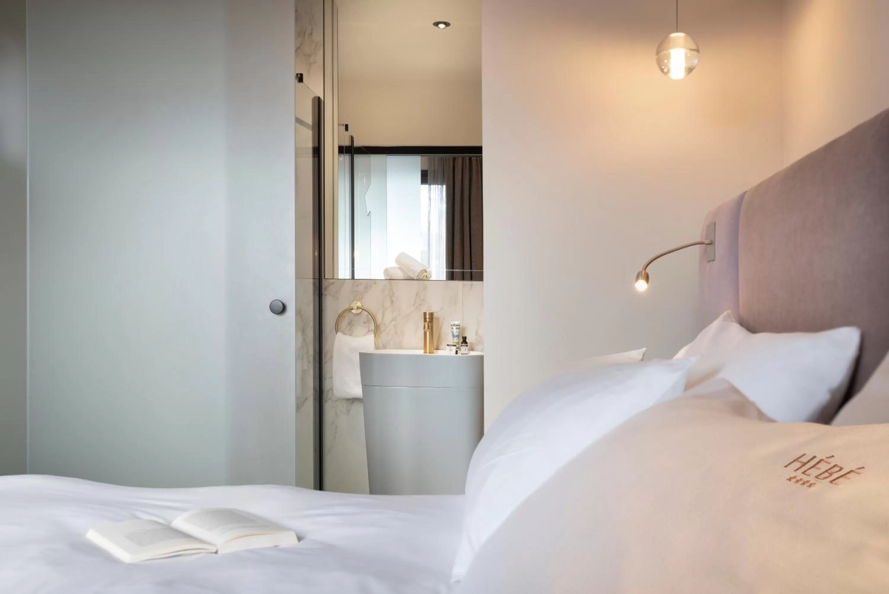 Bed in Hébé Hotel