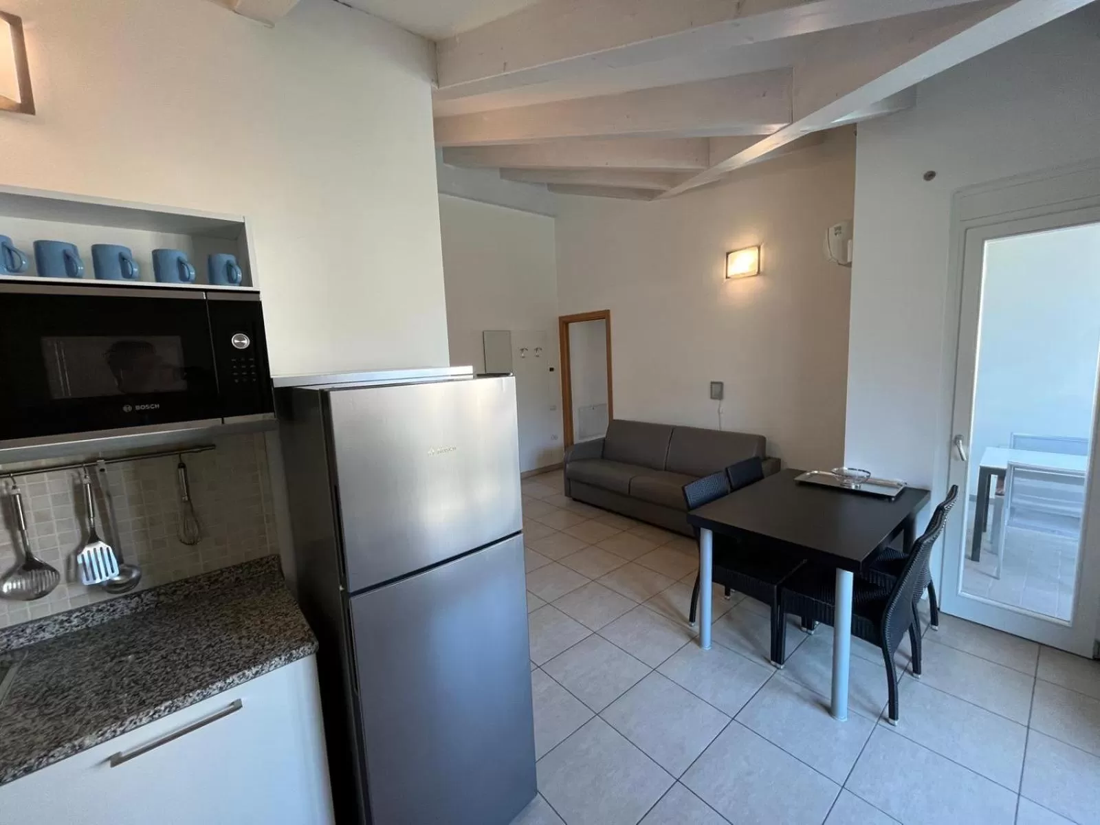 Kitchen or kitchenette in 4 Limoni Apartment Resort