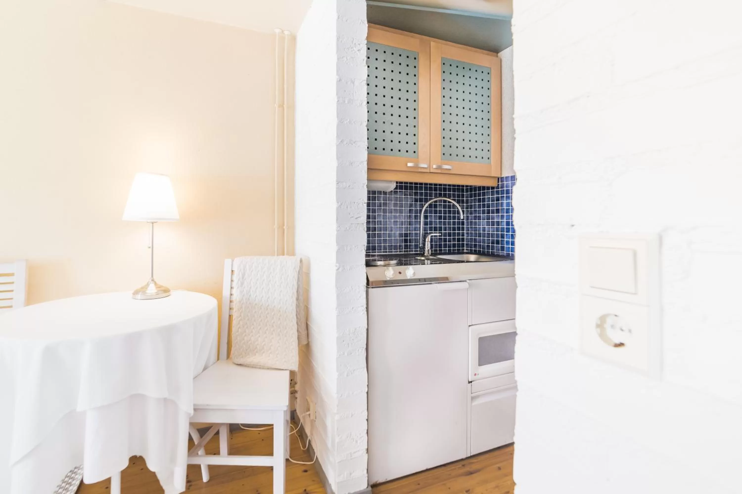 Kitchen or kitchenette in Lossiranta Lodge