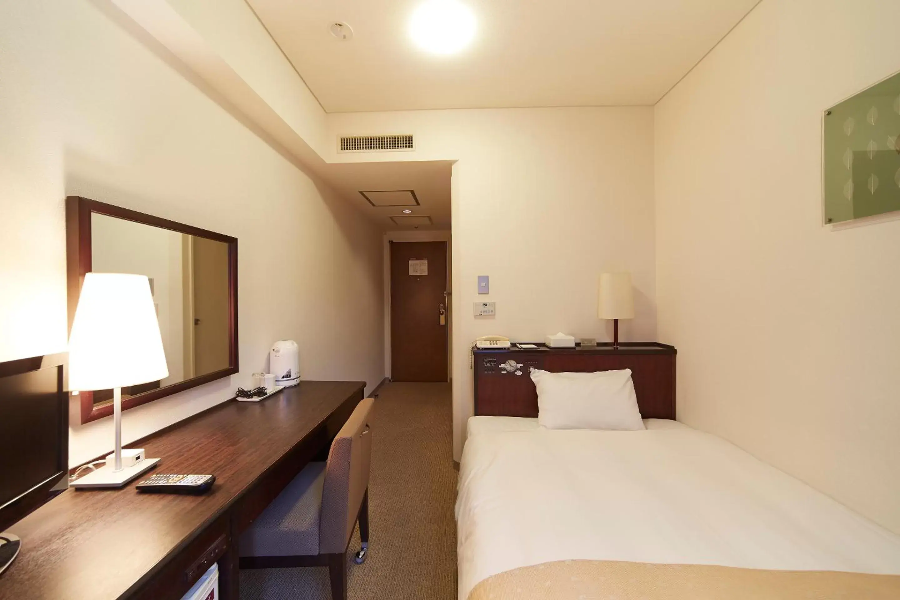 Bed in Nest Hotel Kumamoto