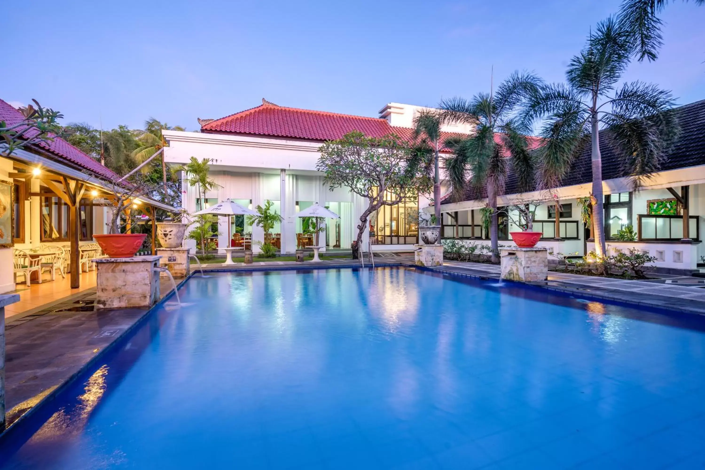 Swimming pool, Property Building in Inna Bali Heritage Hotel