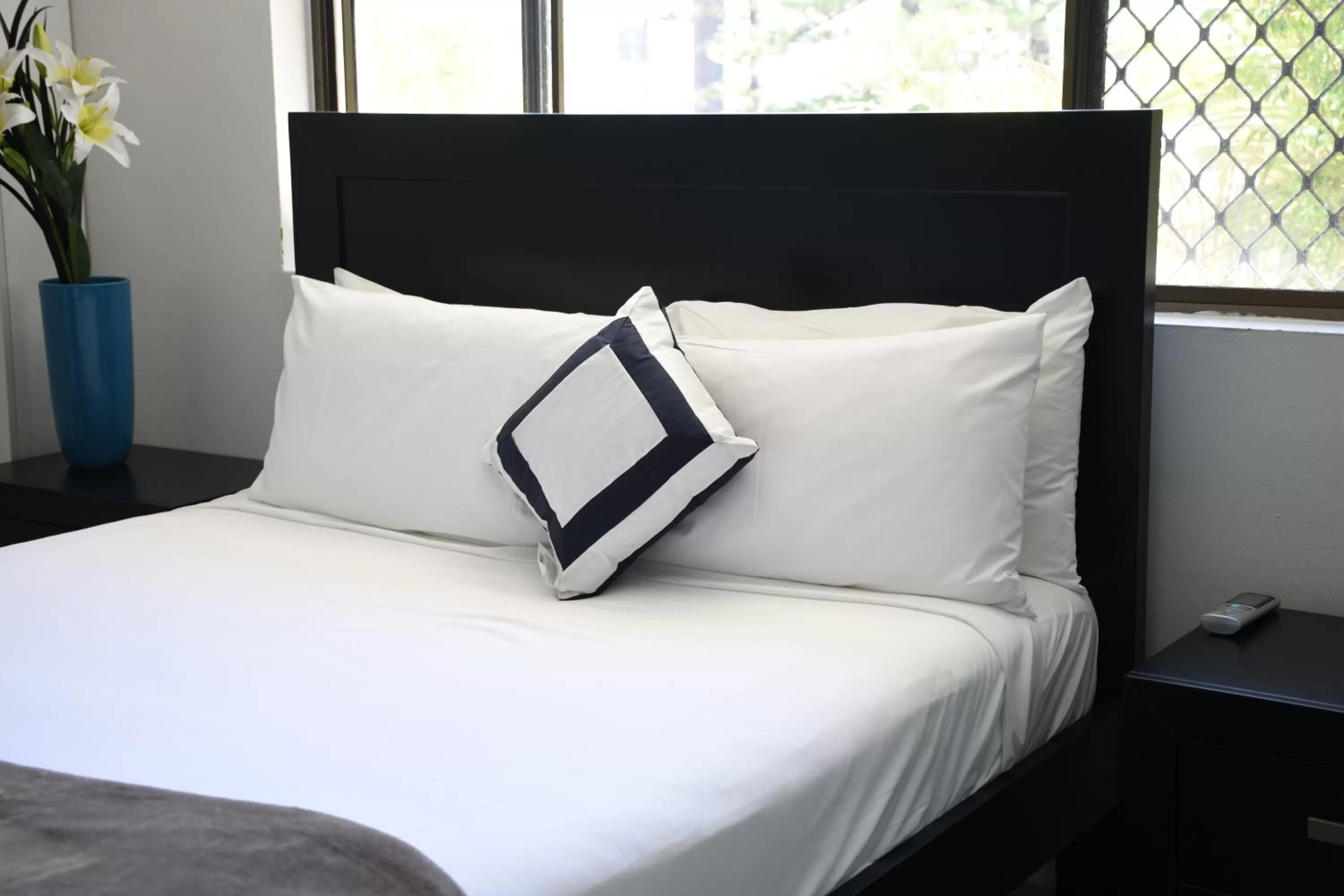 Bed in Copacabana Apartments