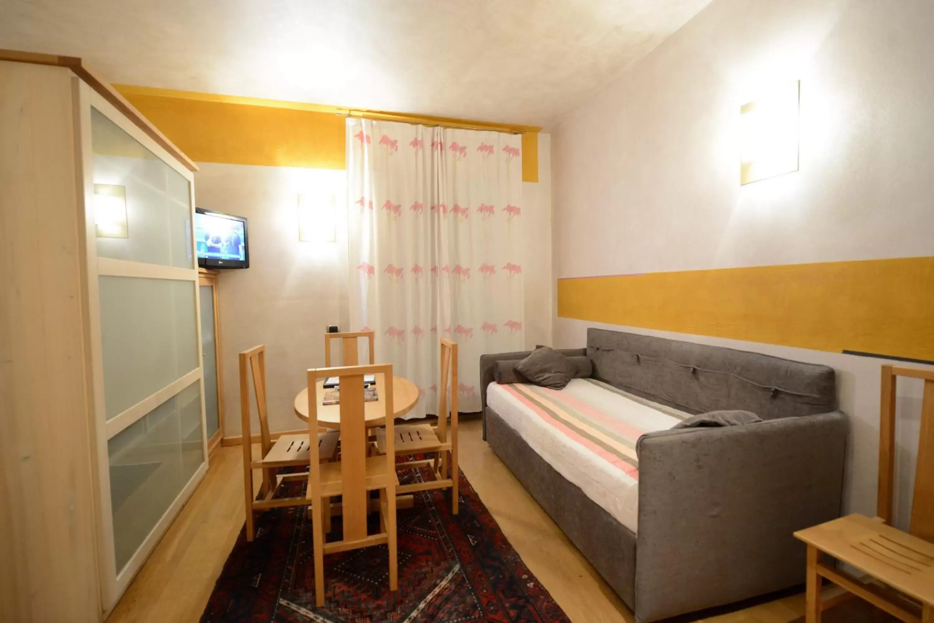 Living room, Room Photo in Appartamenti Porta Nuova 80