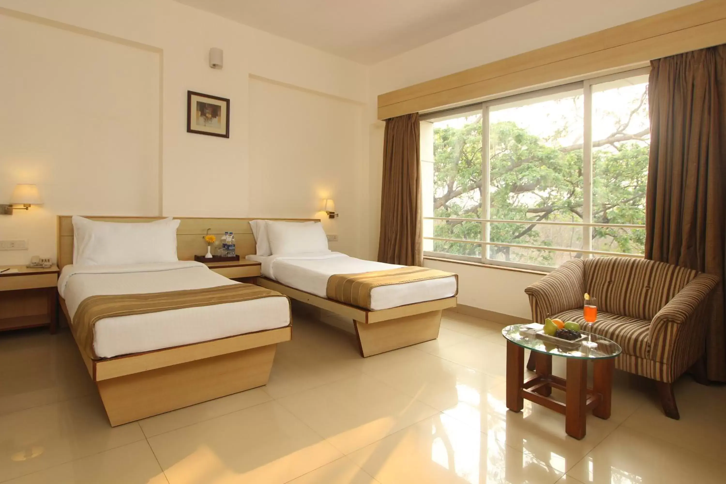 Photo of the whole room, Bed in Hotel Phoenix Koregaon Park Photo of the whole room, Bed in Hotel Phoenix Koregaon Park